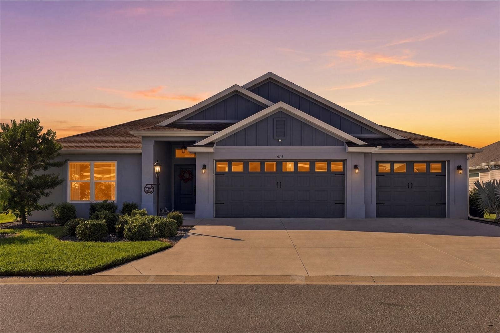 614 LAKE CREEK CIRCLE, The Villages, FL 34762 Front with Twilight