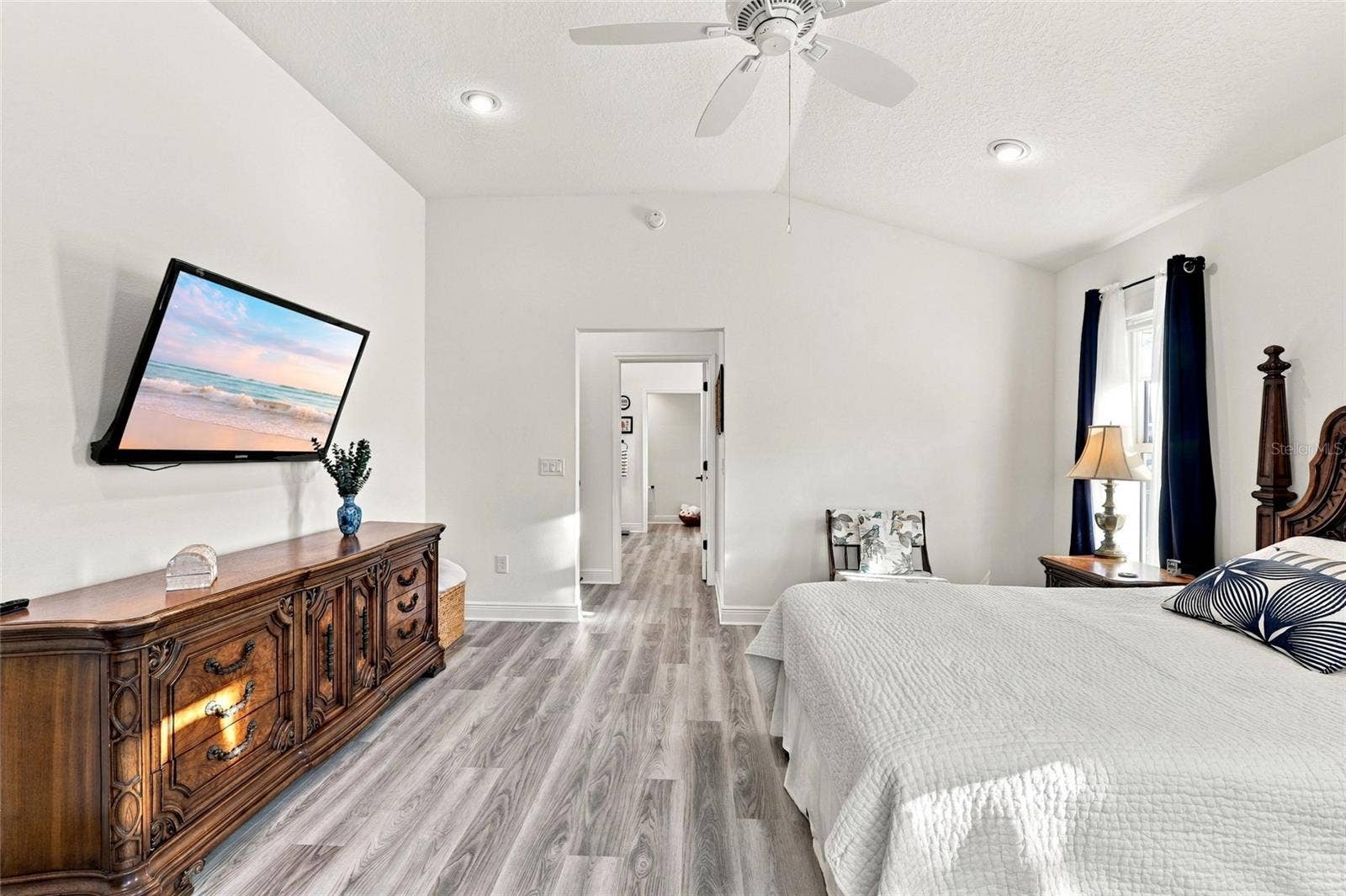 614 LAKE CREEK CIRCLE, The Villages, FL 34762 Primary Bedroom with view toward en-suite and closet
