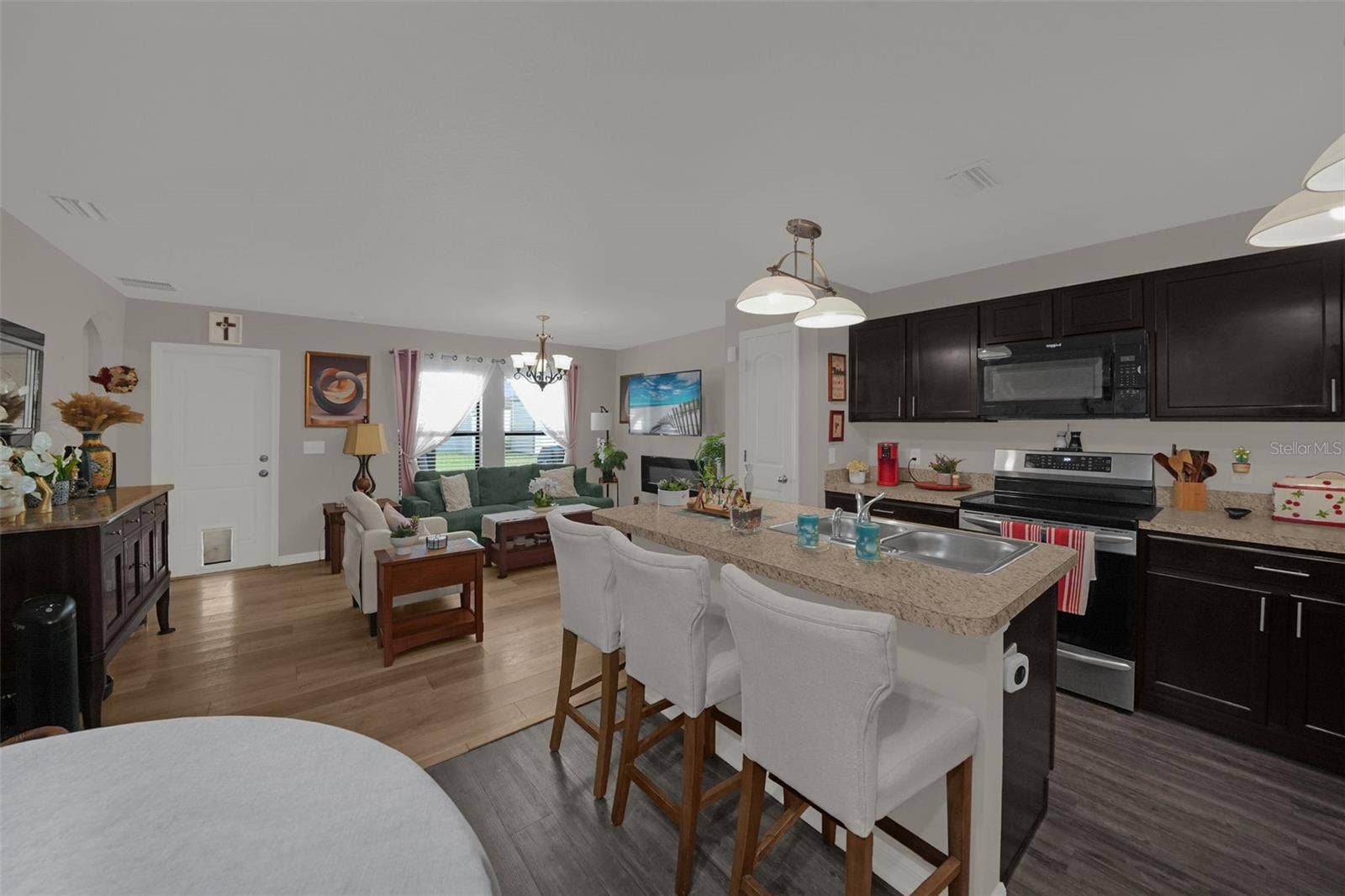 26448 BERTRAM ROAD, Brooksville, FL 34602 Kitchen with island and breakfast bar