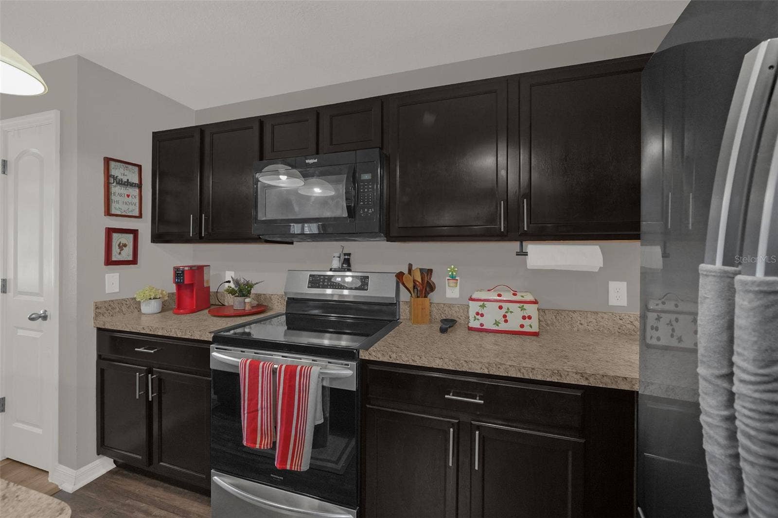 26448 BERTRAM ROAD, Brooksville, FL 34602 Kitchen with stainless steel appliances