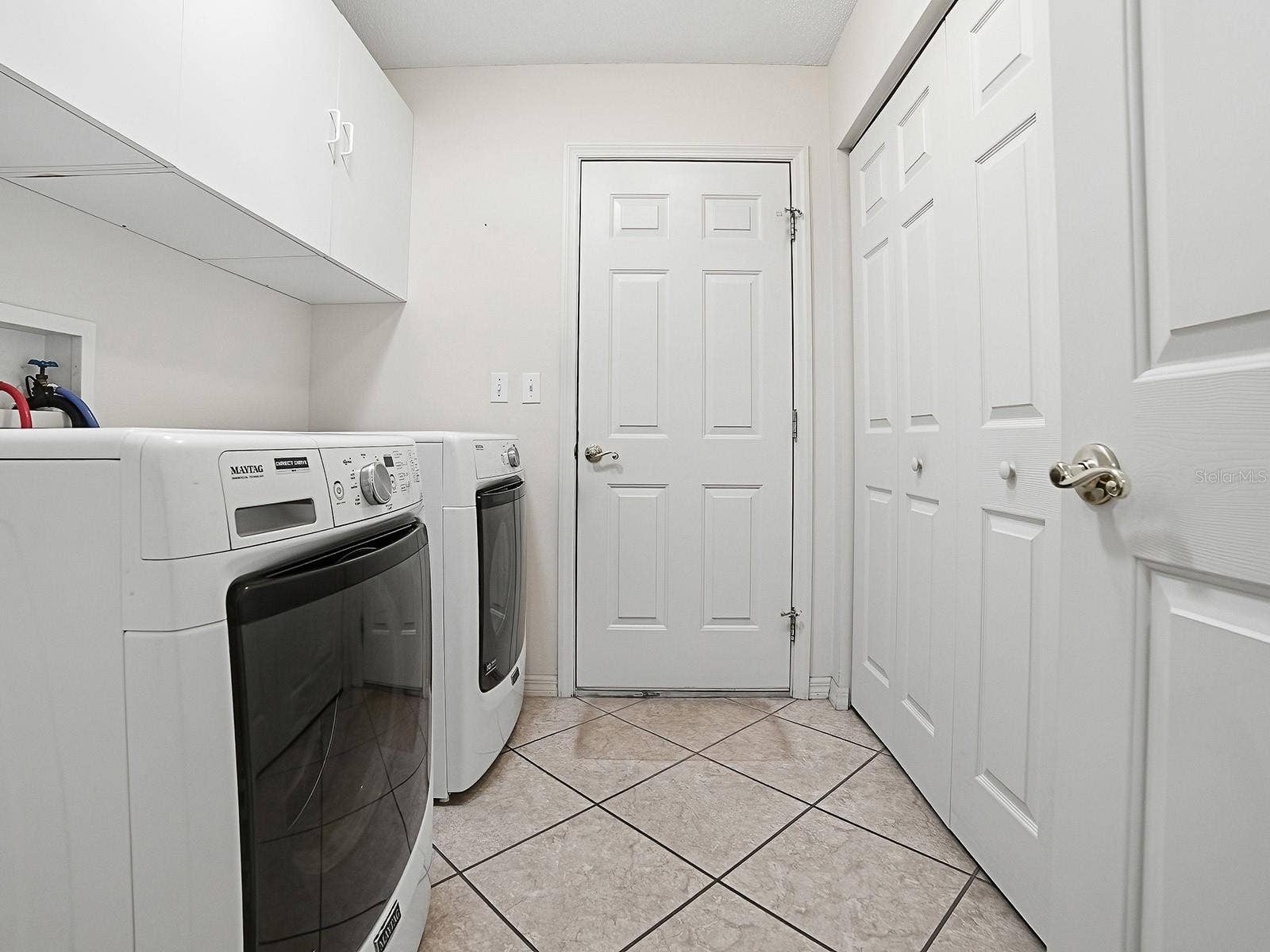 424 RANCHWOOD DRIVE, Leesburg, FL 34748 INSIDE LAUNDRY