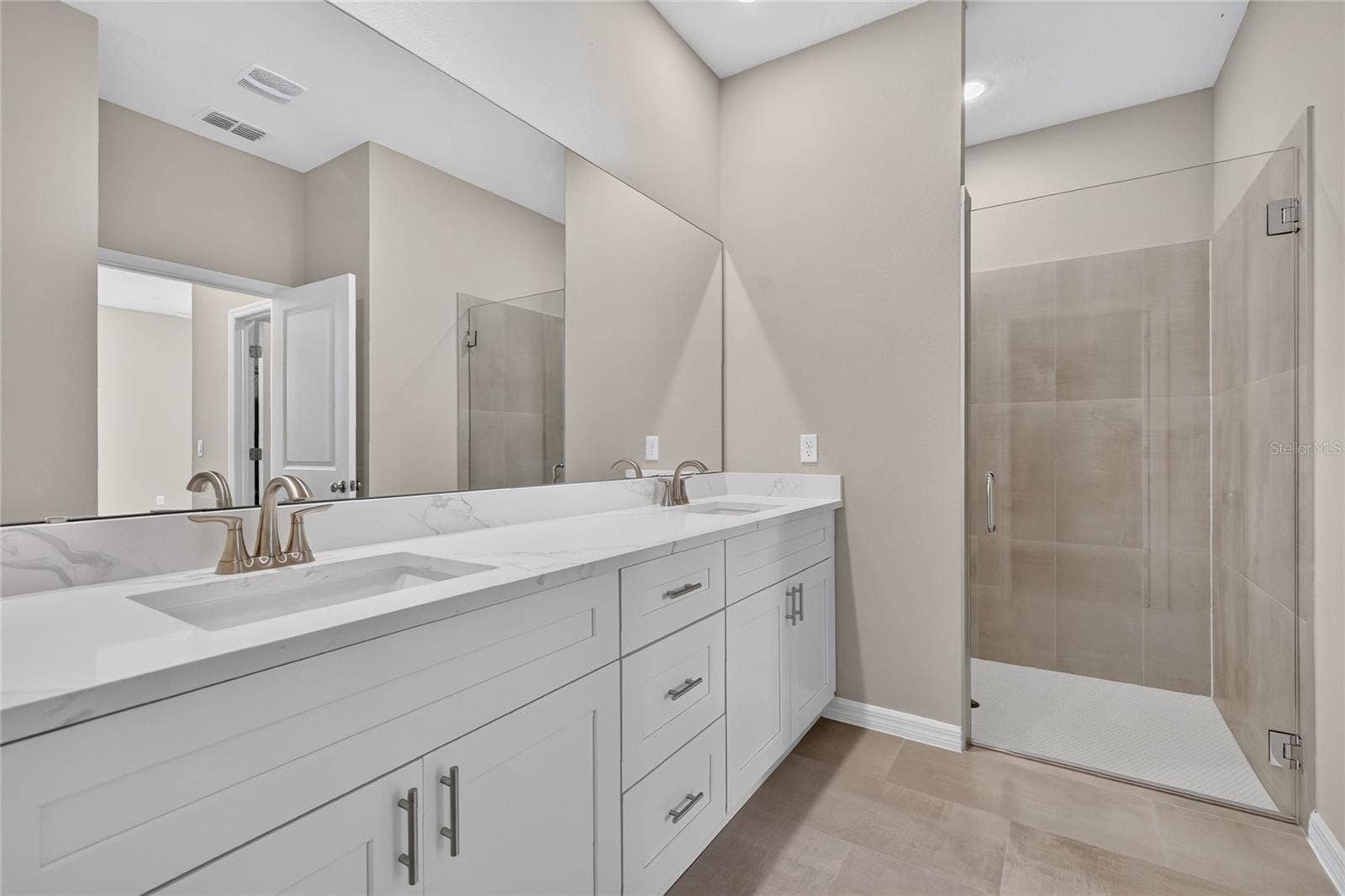 41428 ROYAL TRAILS ROAD, Eustis, FL 32736 Primary bath room/dual sinks and walk in shower