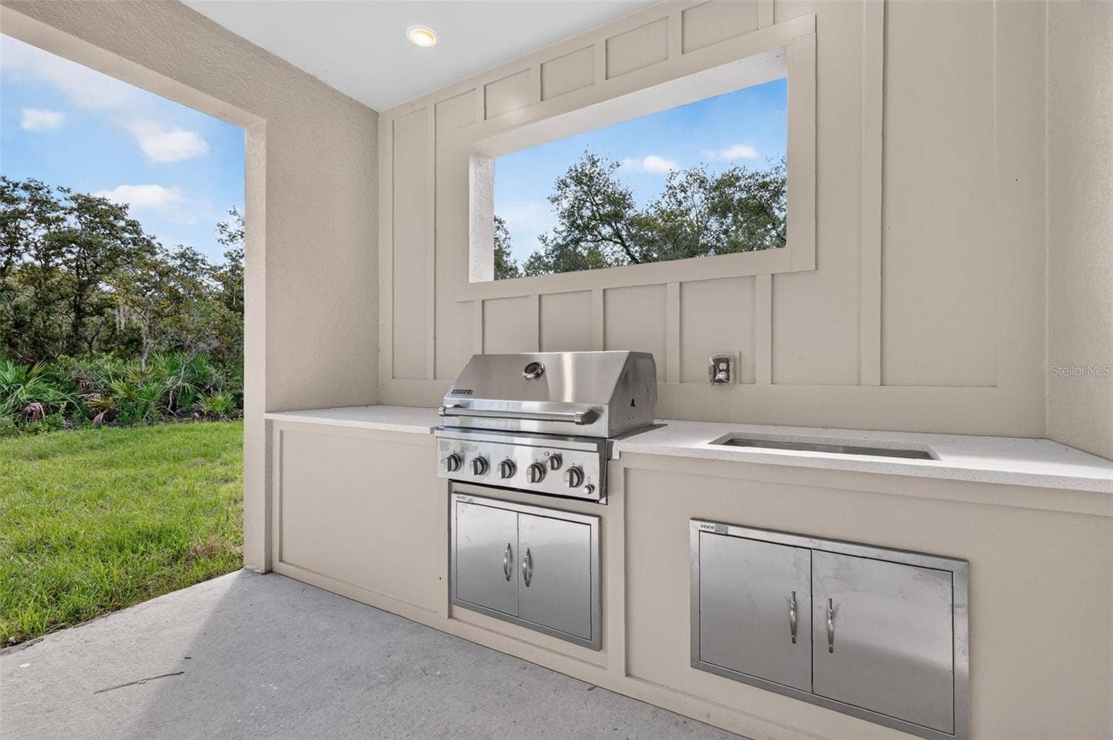 41428 ROYAL TRAILS ROAD, Eustis, FL 32736 Outdoor grill and sink on back porch