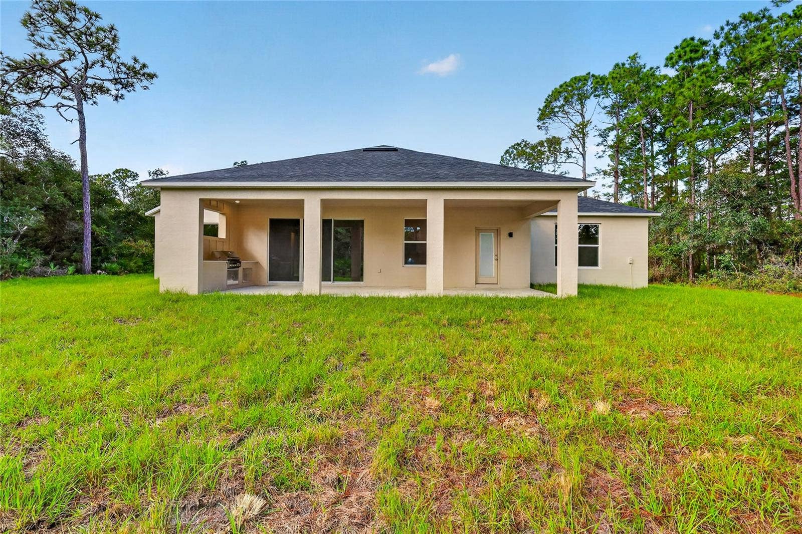 41428 ROYAL TRAILS ROAD, Eustis, FL 32736 Back view of home with plenty of room for a pool