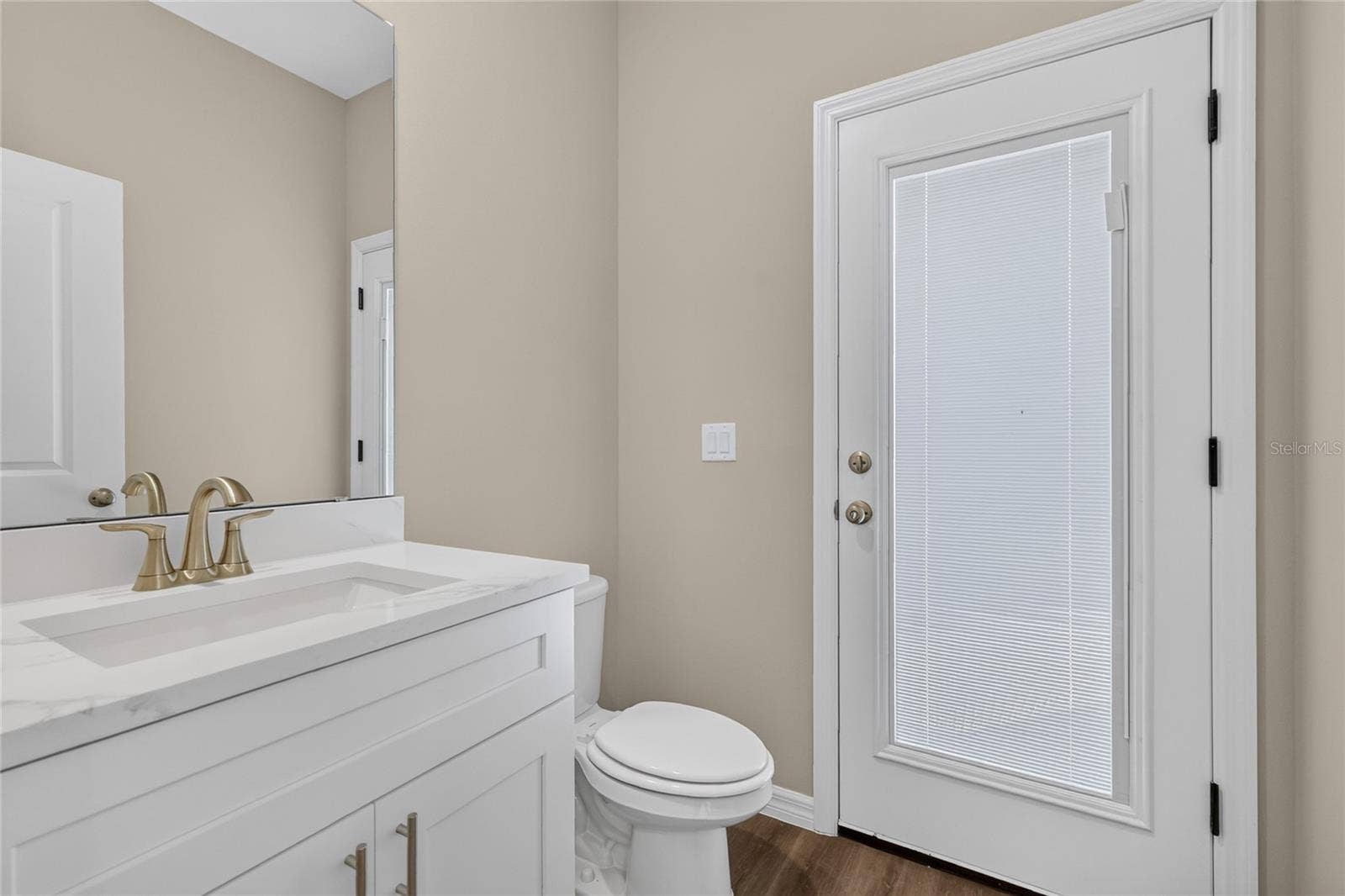 41428 ROYAL TRAILS ROAD, Eustis, FL 32736 Half bath leads to back porch