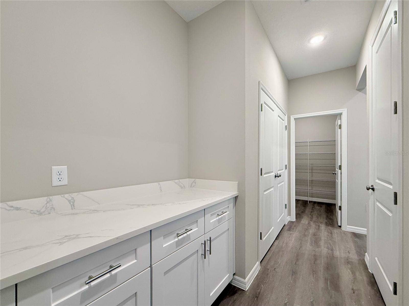 41428 ROYAL TRAILS ROAD, Eustis, FL 32736 Folding table area with cabinets, extra closet area and walk in pantry