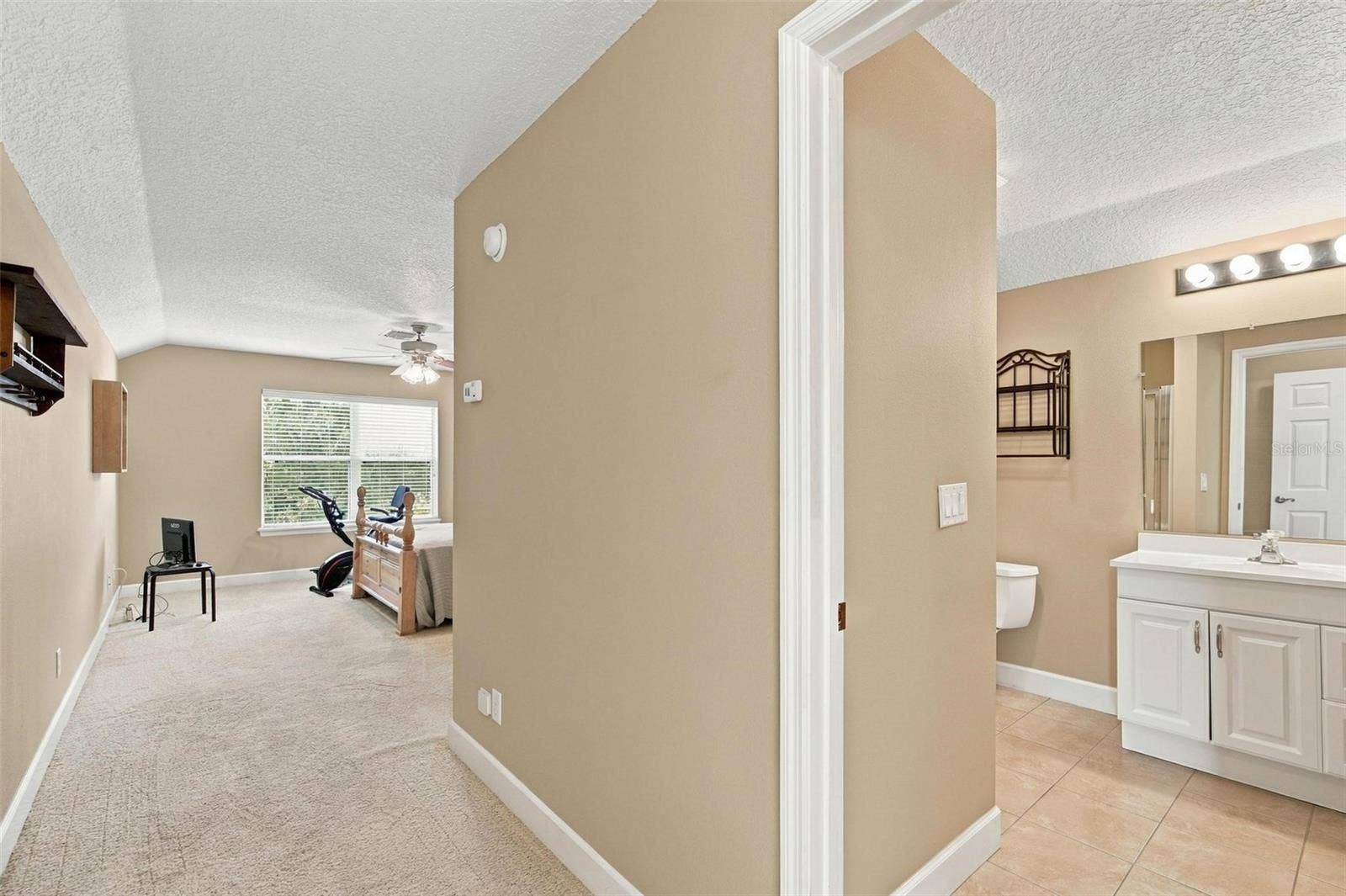 15330 SKY LAKE LANE, Tavares, FL 32778 UPSTAIRS PRIMARY SUITE