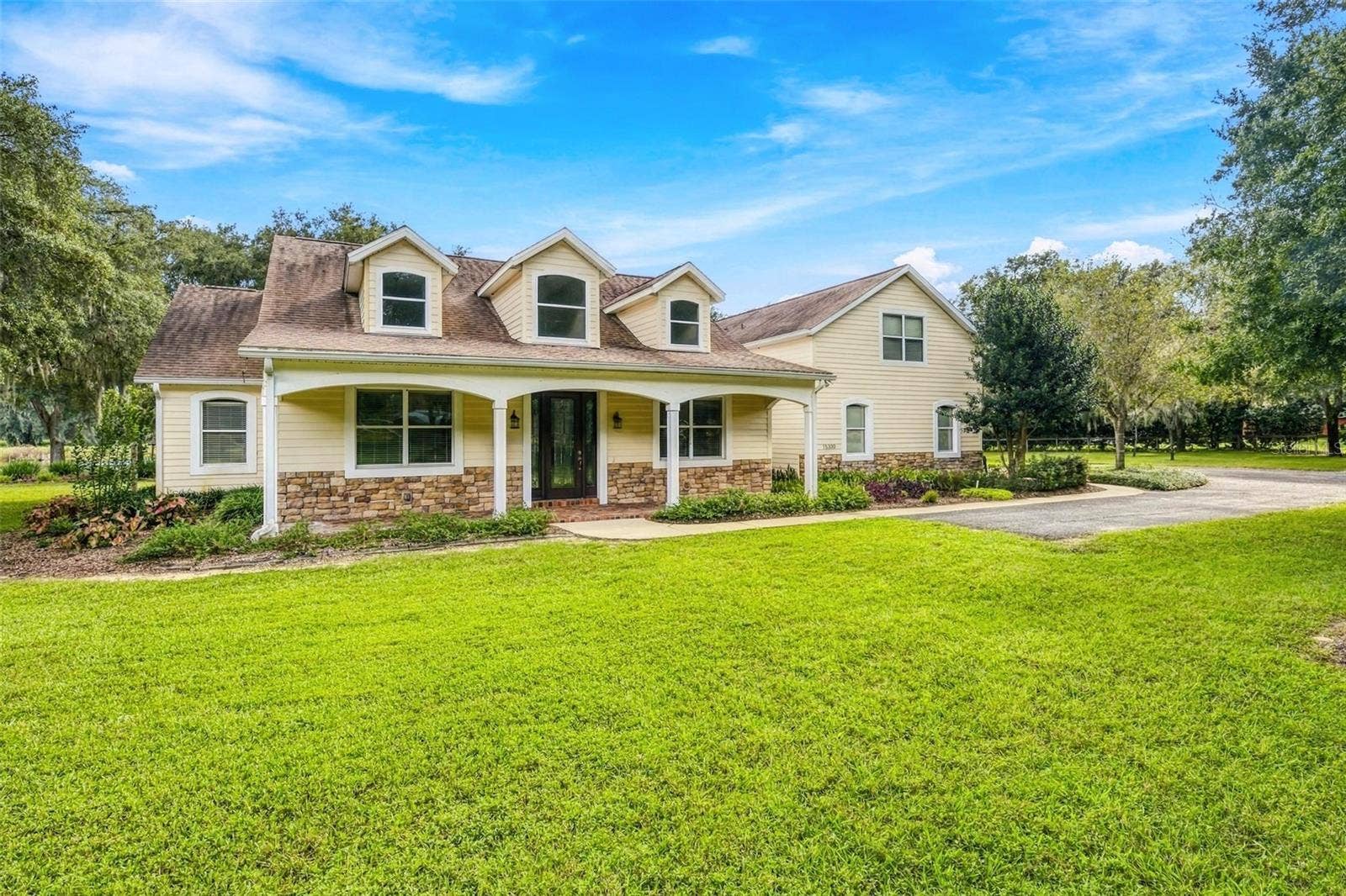 15330 SKY LAKE LANE, Tavares, FL 32778 FRONT EXTERIOR