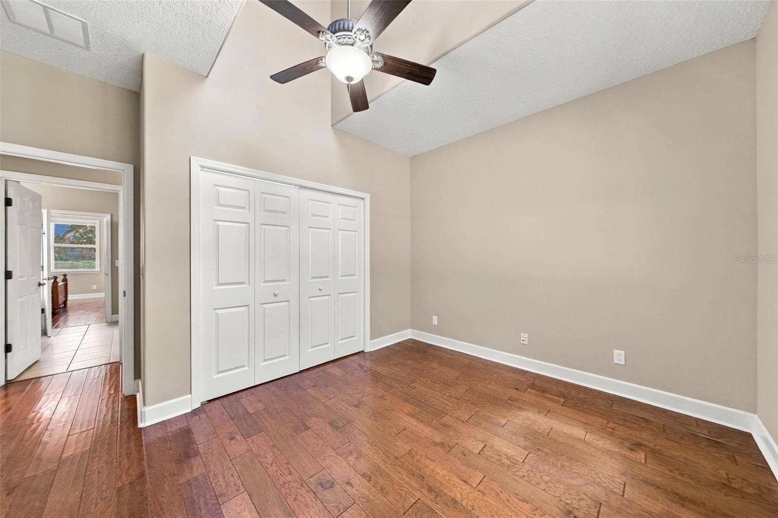 15330 SKY LAKE LANE, Tavares, FL 32778 LARGE GUEST BEDOOM IN GUEST WING