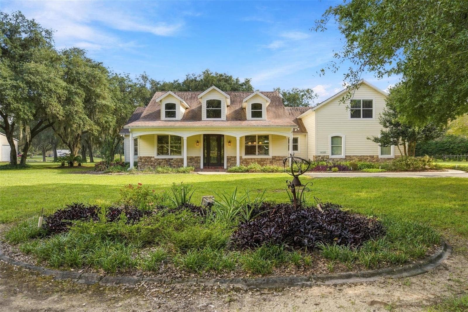 15330 SKY LAKE LANE, Tavares, FL 32778 FRONT LANDSCAPE