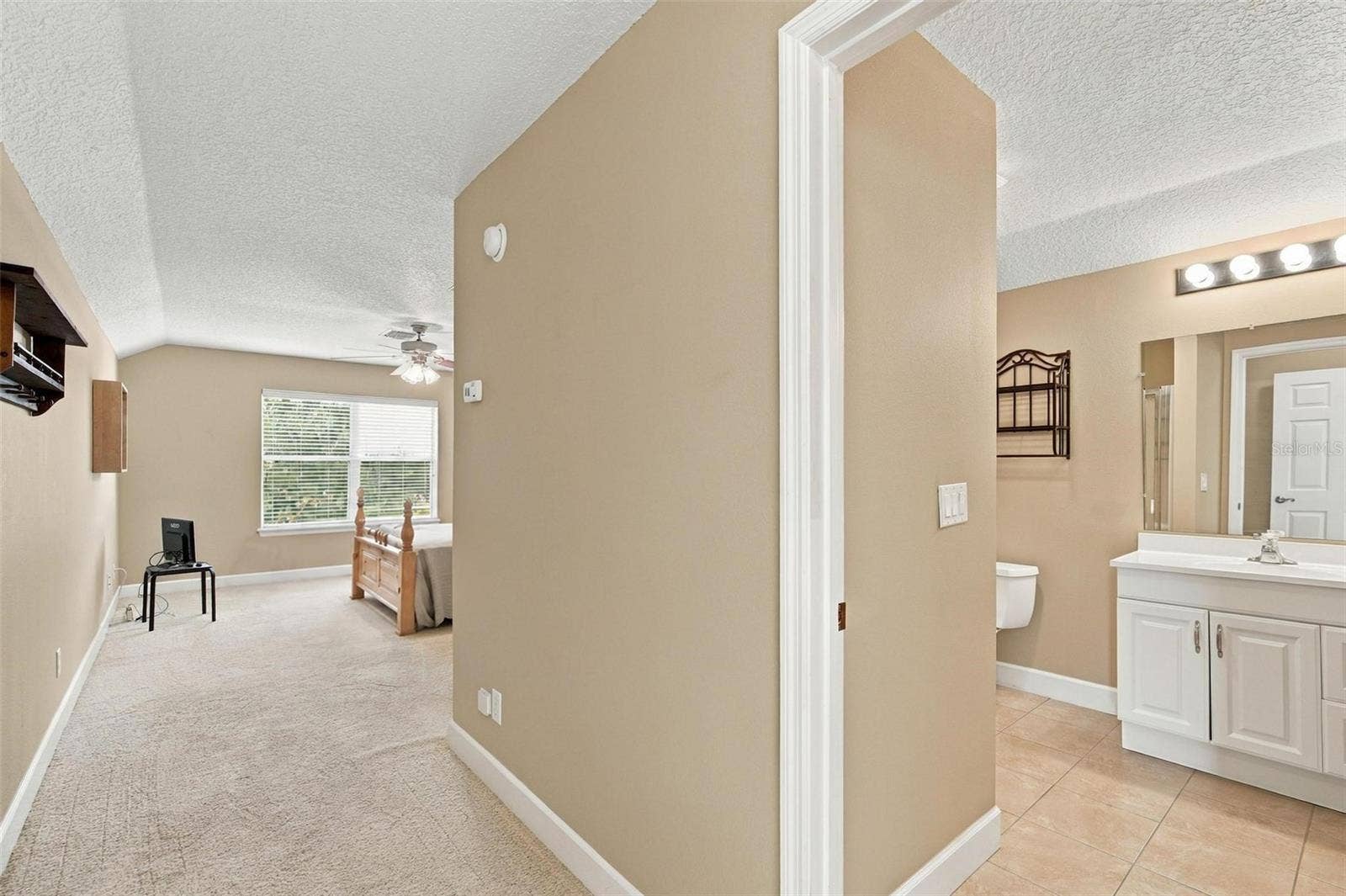 15330 SKY LAKE LANE, Tavares, FL 32778 UPSTAIRS PRIMARY SUITE