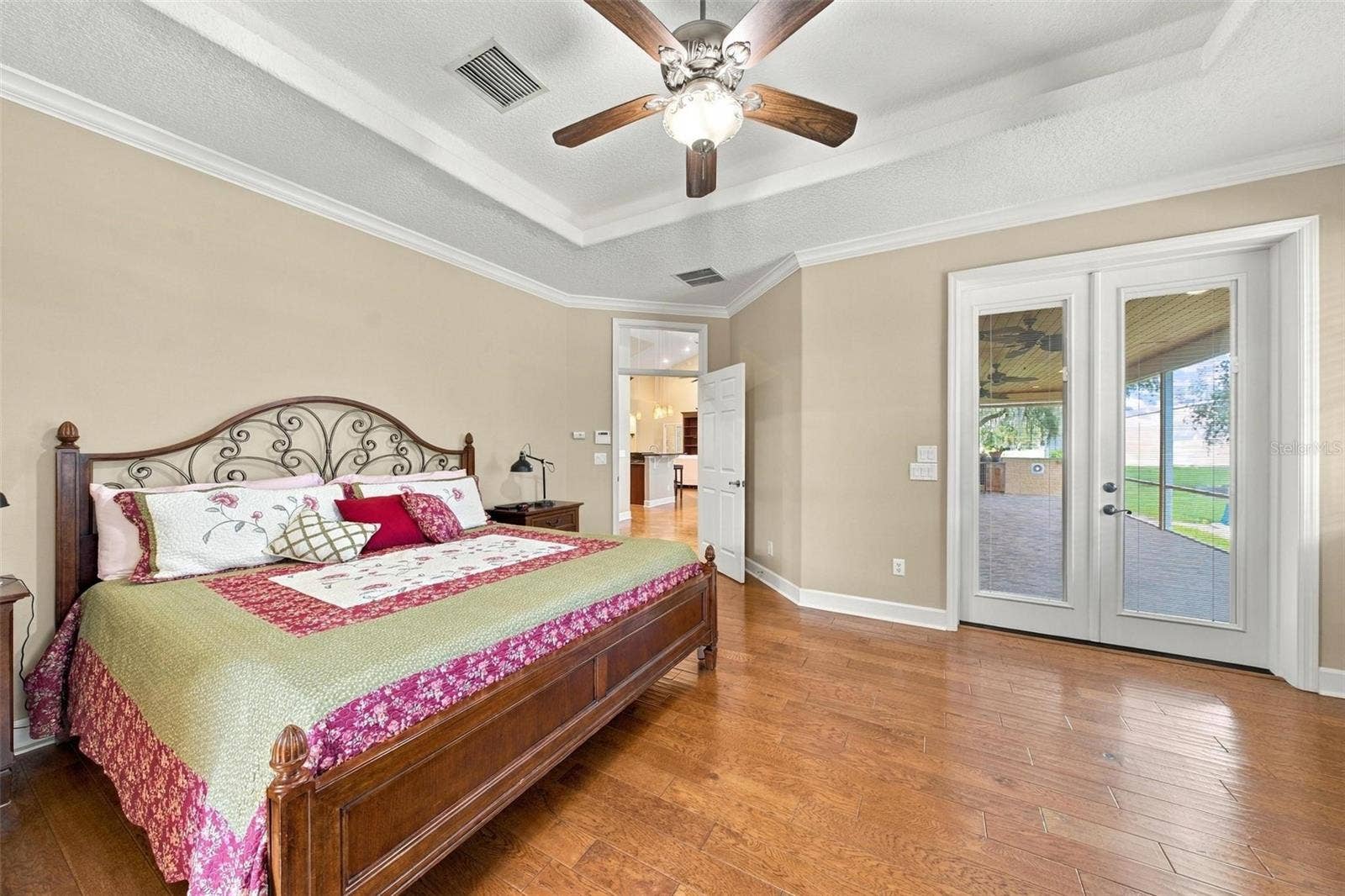 15330 SKY LAKE LANE, Tavares, FL 32778 1ST FLOOR PRIMARY SUITE WITH FRENCH DOORS