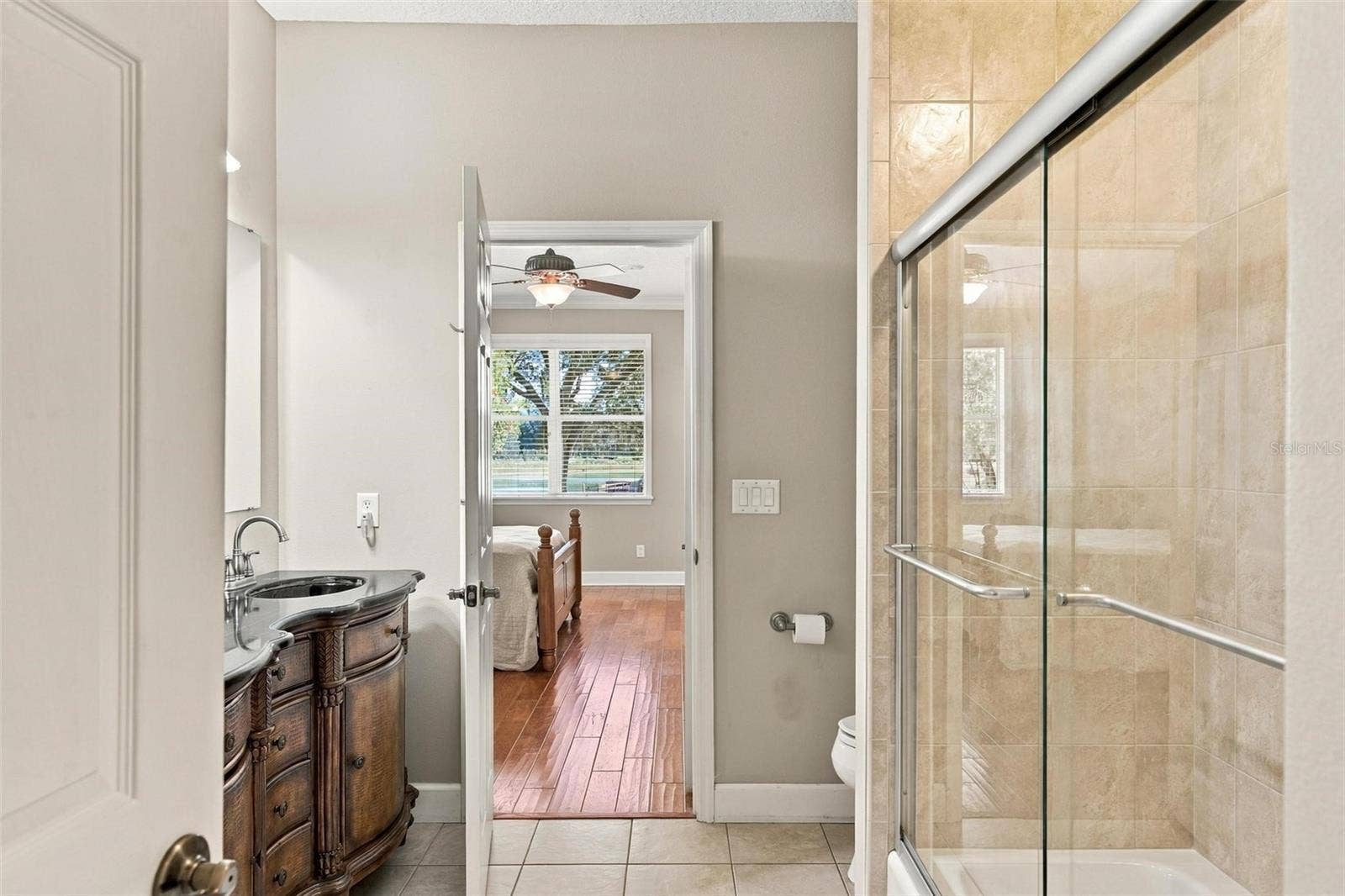 15330 SKY LAKE LANE, Tavares, FL 32778 VIEW FROM 2ND PRIMARY ENSUITE INTO PRIMARY SUITE