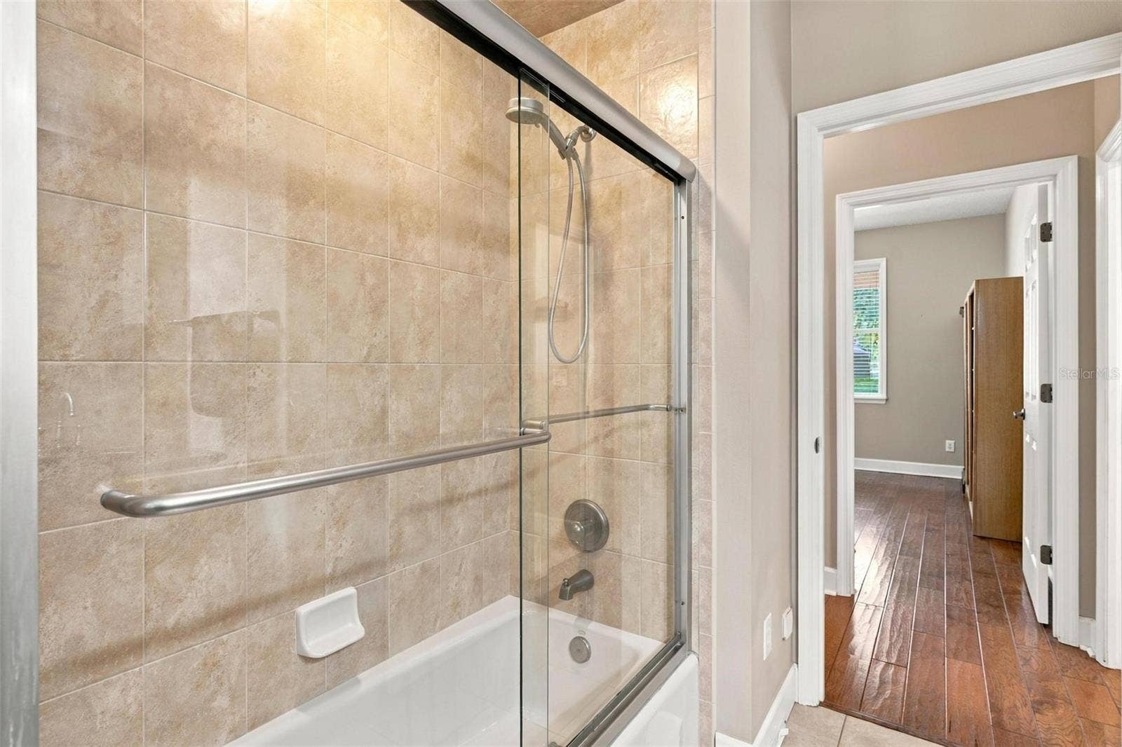 15330 SKY LAKE LANE, Tavares, FL 32778 2ND PRIMARY SUITE ENSUITE WITH TUB & SHOWER