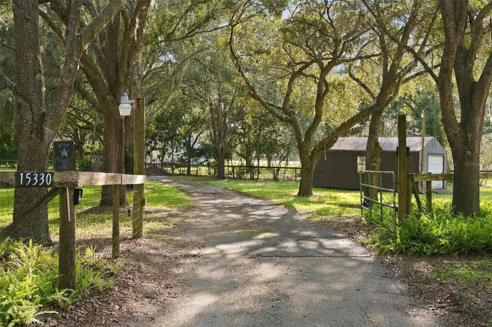 15330 SKY LAKE LANE, Tavares, FL 32778 PRIVATE GATE