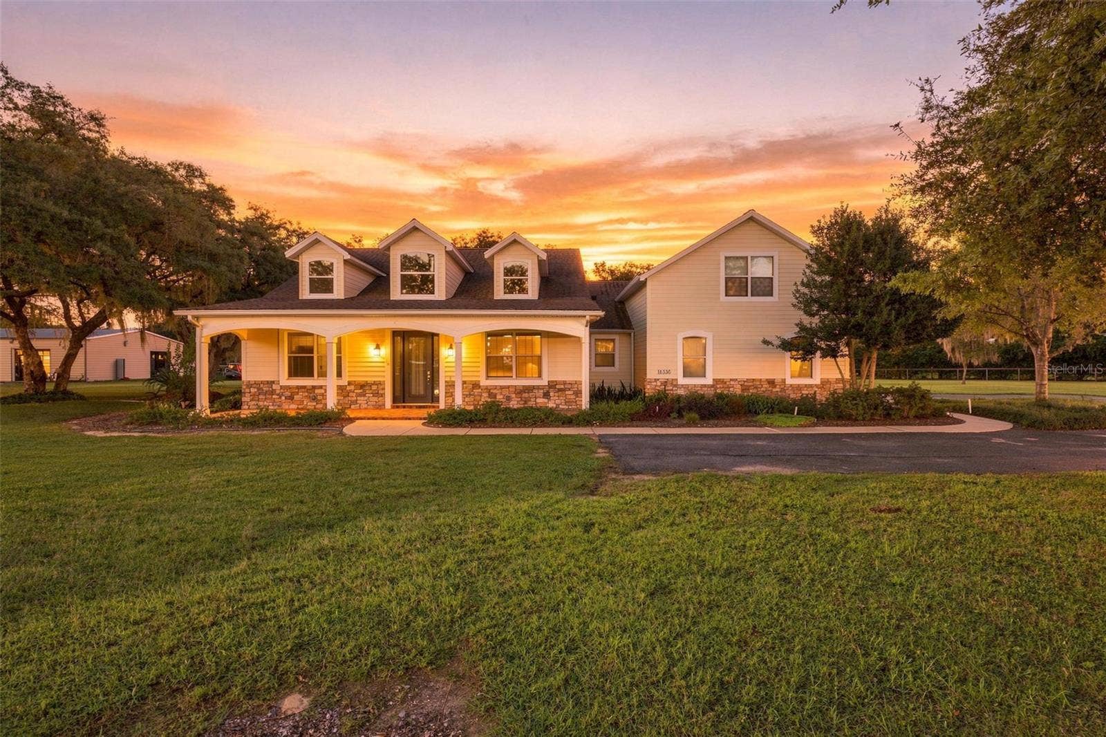 15330 SKY LAKE LANE, Tavares, FL 32778 FRONT EXTERIOR