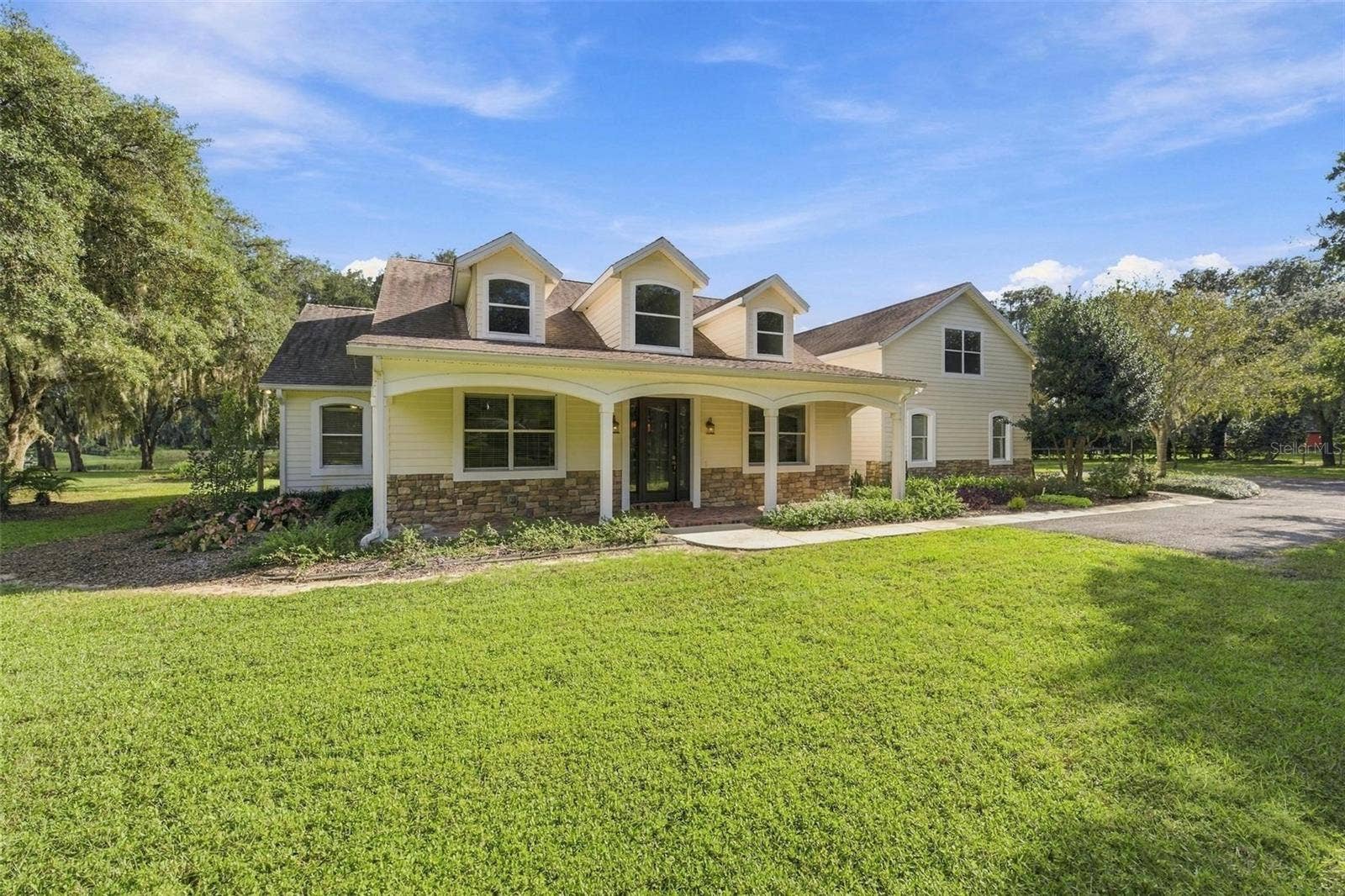 15330 SKY LAKE LANE, Tavares, FL 32778 ADDITIONAL SIDE PARKING IN FRONT OF GARAGE