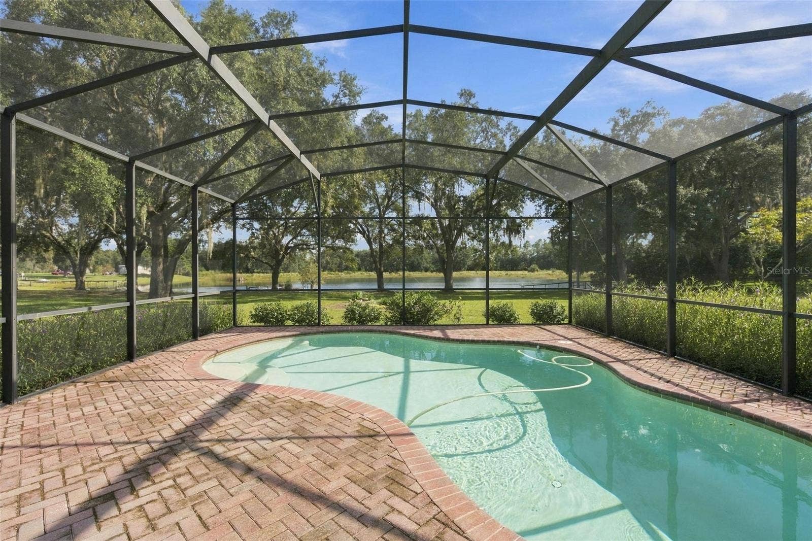 15330 SKY LAKE LANE, Tavares, FL 32778 HUGE POOL DECK WITH LAKE VIEWS