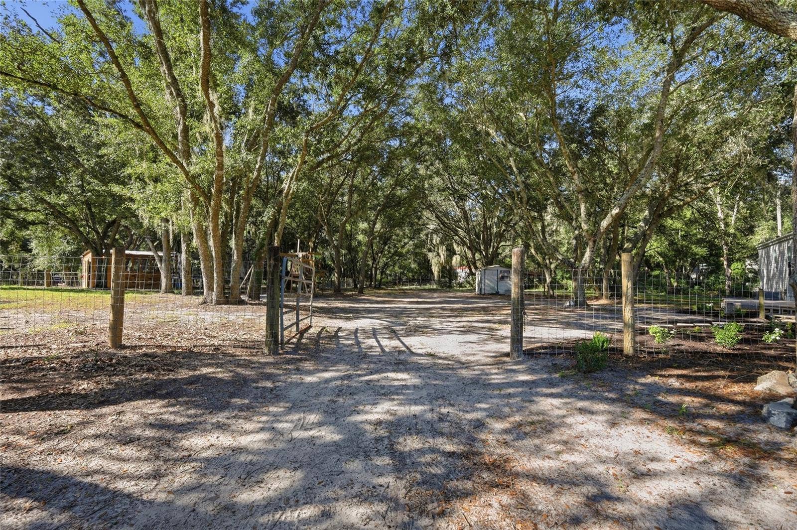 Gate to back of home 1 large of 3 large fenced in areas