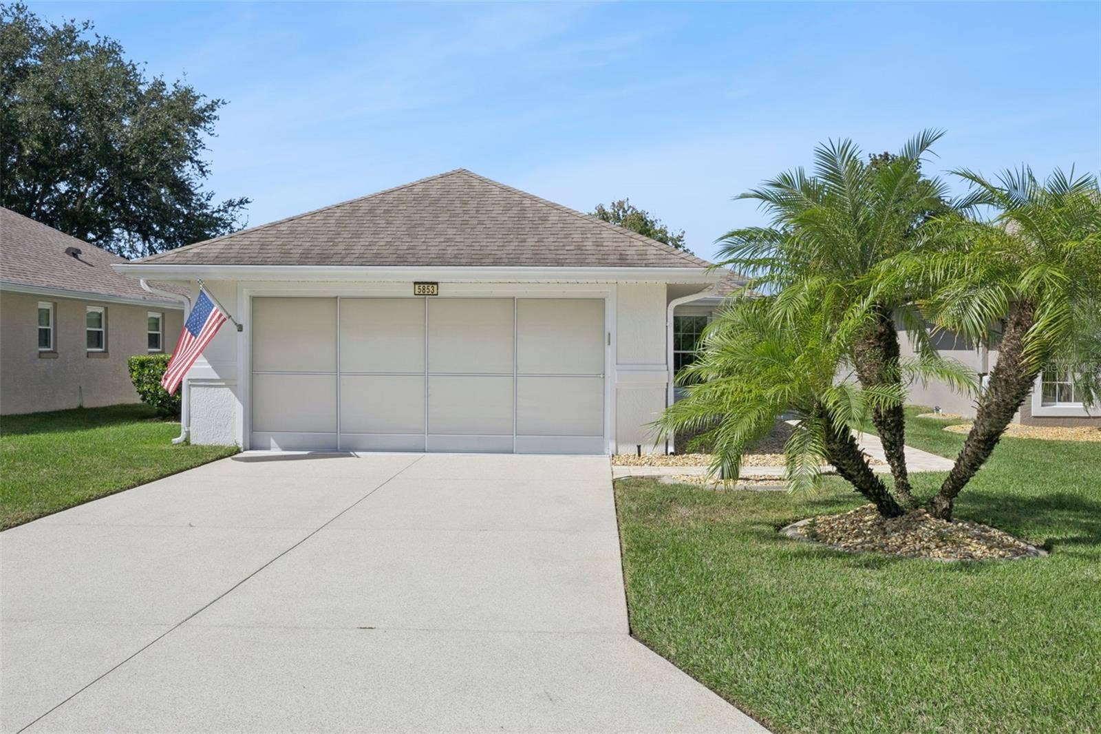 5853 PRINCESS CAROLINE PLACE, Leesburg, FL 34748 Low maintenance landscaping