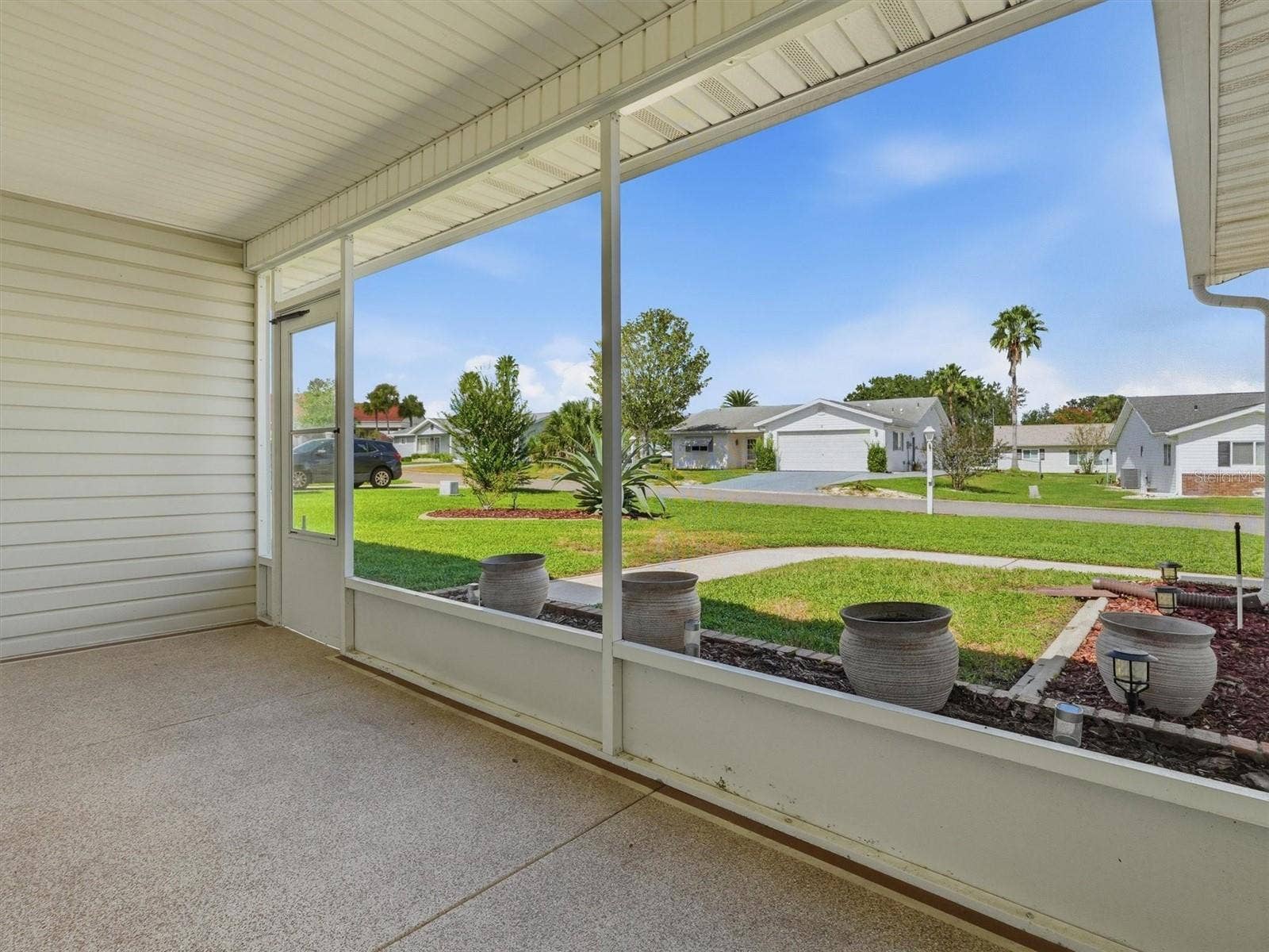 9892 SE 177TH LANE, Summerfield, FL 34491 Screened Front Porch