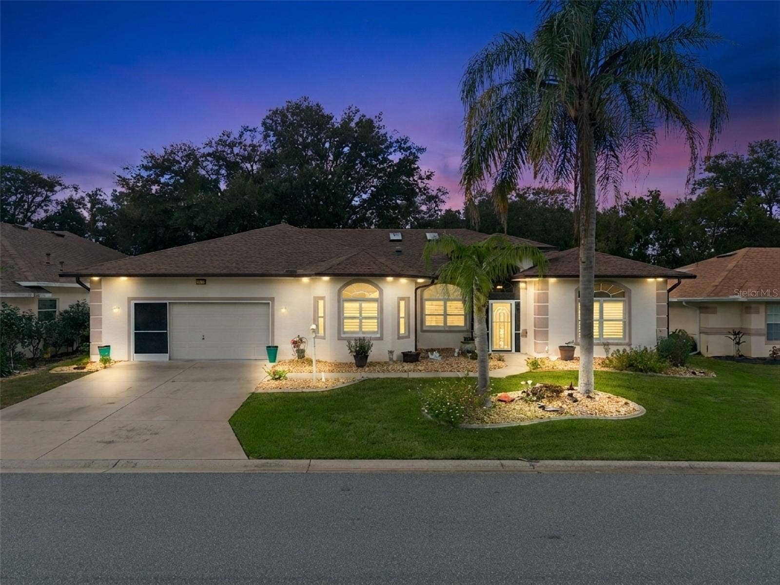21113 EDINBOROUGH PLACE, Leesburg, FL 34748 Twilight front elevation