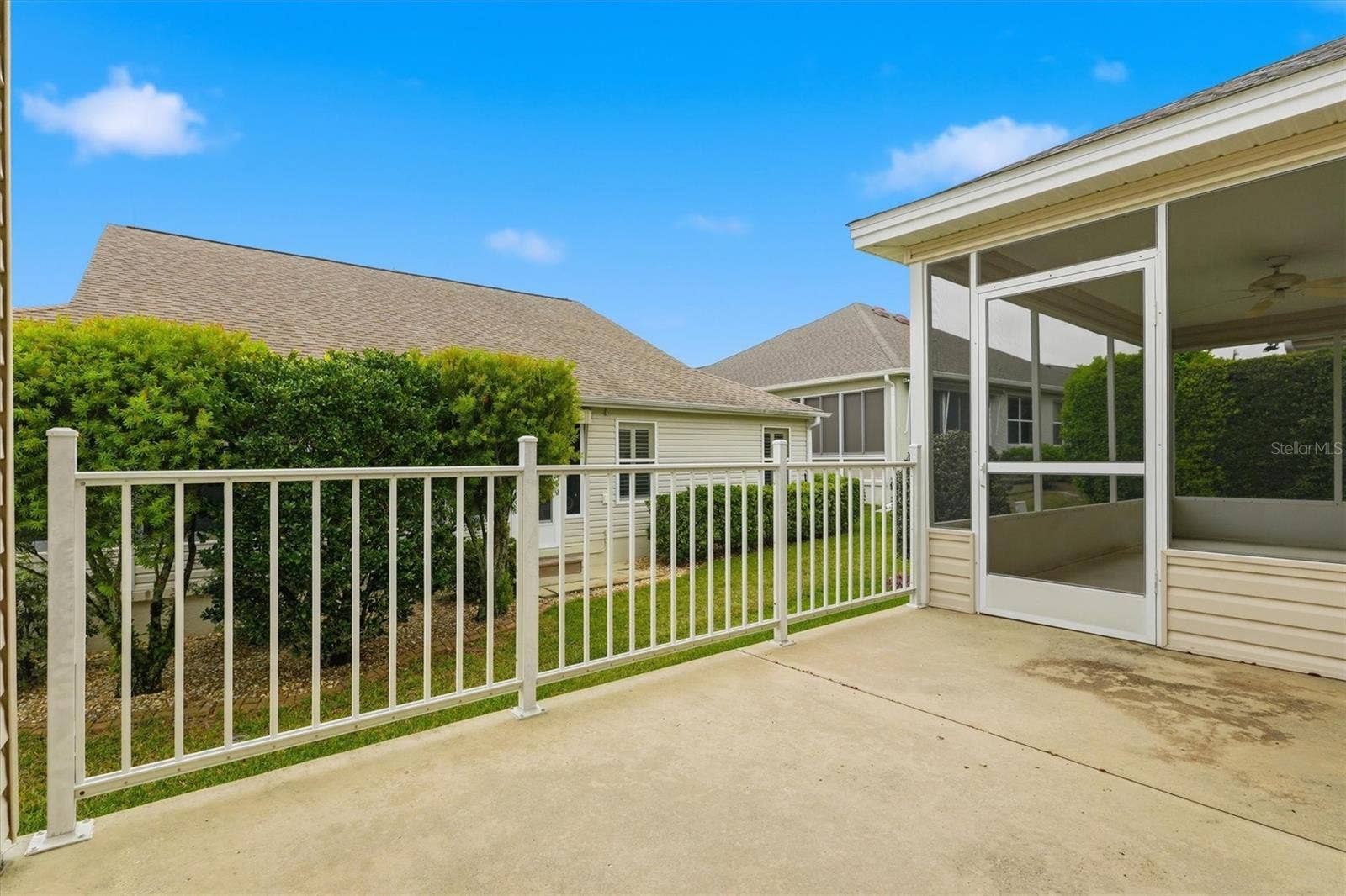 1563 EASTOVER TERRACE, The Villages, FL 32162 Lanai opens up to the outdoor Patio perfect for the BBQ Grill or small fire pit.