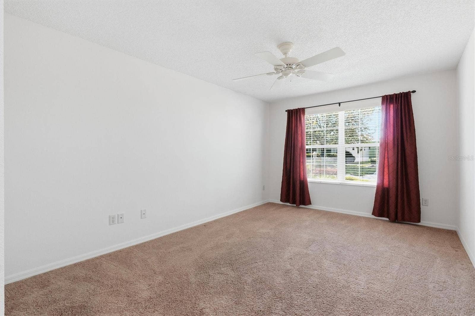 1563 EASTOVER TERRACE, The Villages, FL 32162 Bedroom #3 Guest bedroom, carpet and ceiling fan.