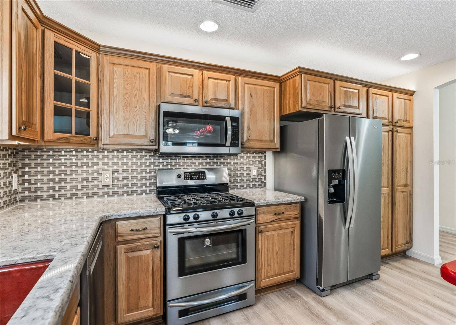 2762 MORVEN PARK WAY, The Villages, FL 32162 Stainless Steal Appliances & Gas Range.