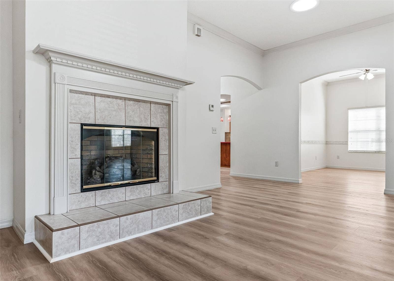 2762 MORVEN PARK WAY, The Villages, FL 32162 Gas Fireplace Facing Bonus Room.