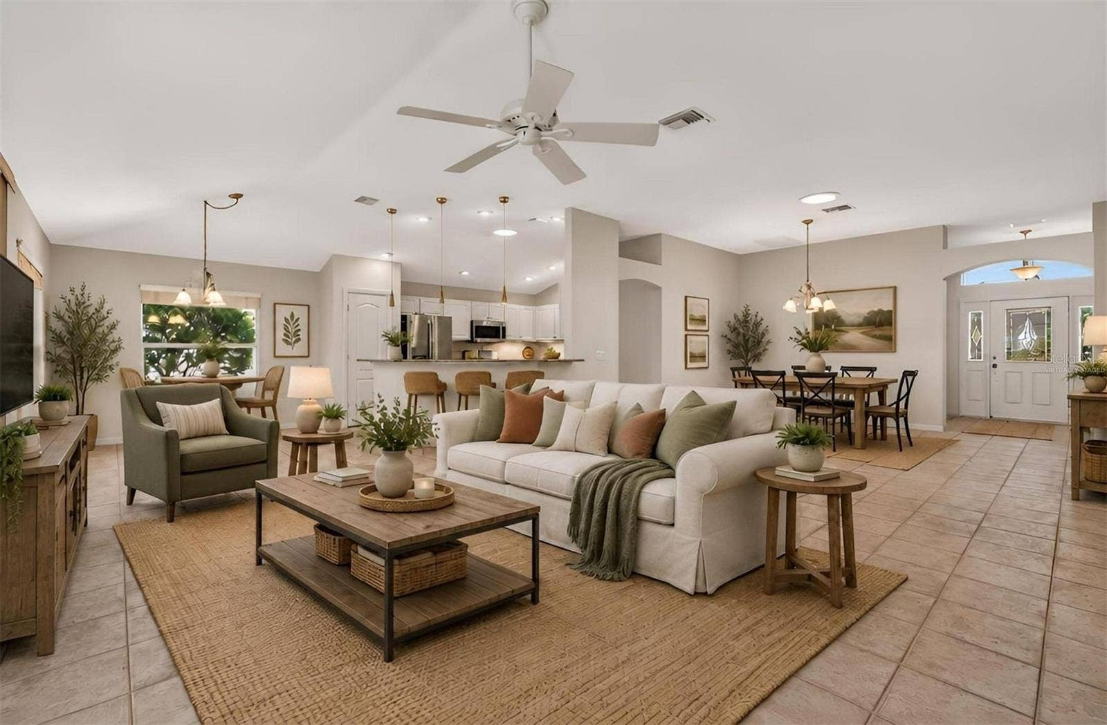 16840 SE 85TH SAPELO COURT, The Villages, FL 32162 Living, Dining, Kitchen, and Dinette-Virtually Staged