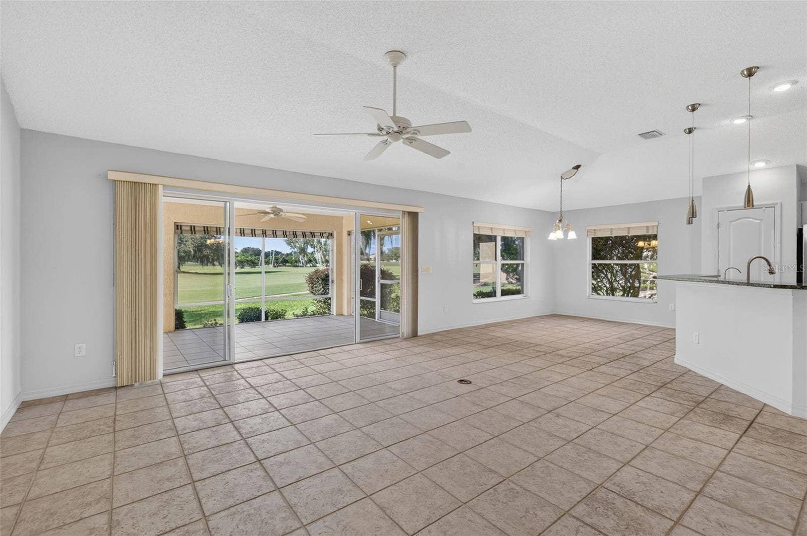 16840 SE 85TH SAPELO COURT, The Villages, FL 32162 Living, Kitchen, and Dinette