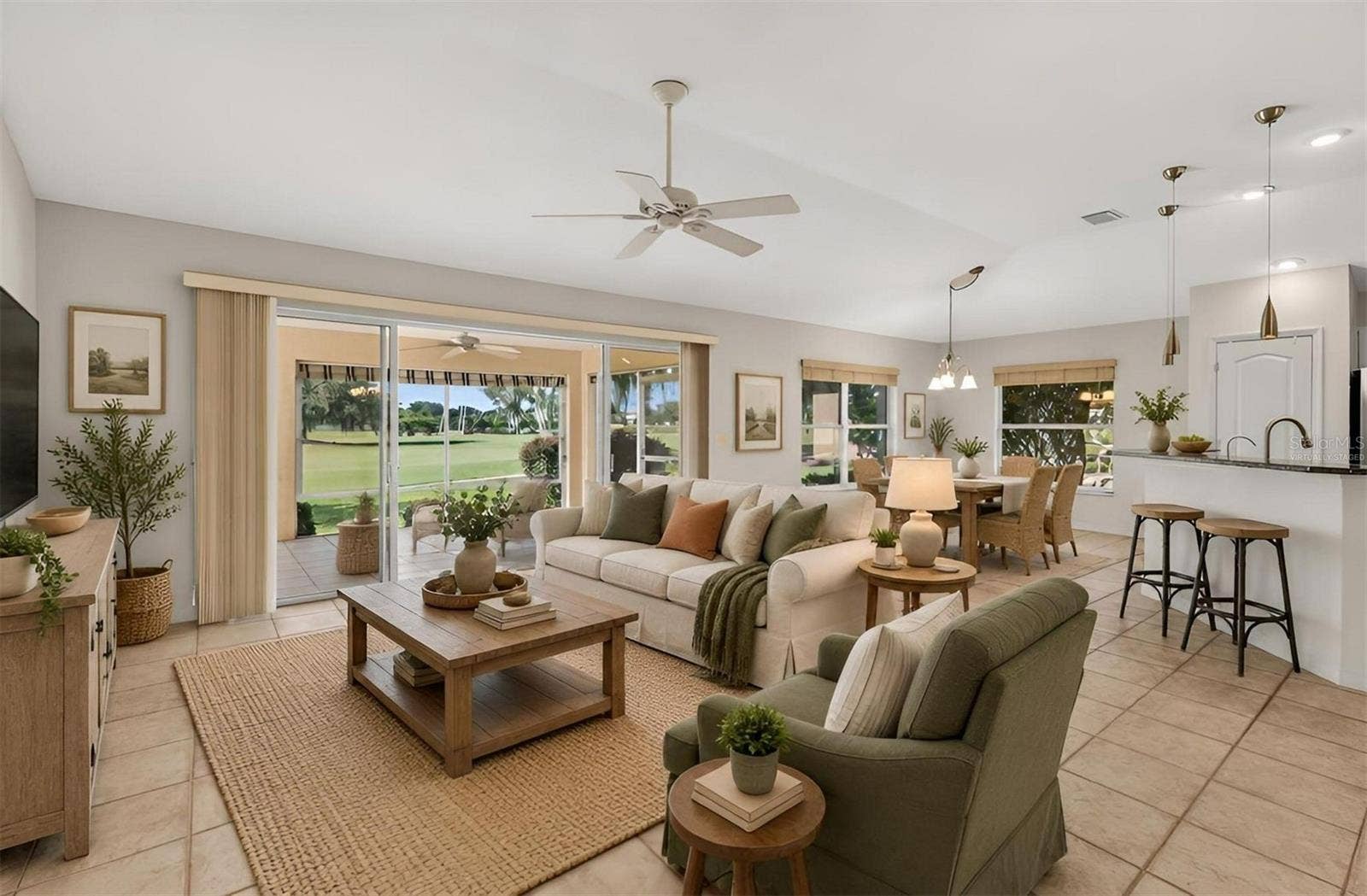 16840 SE 85TH SAPELO COURT, The Villages, FL 32162 Living, Kitchen, and Dinette-Virtually Staged