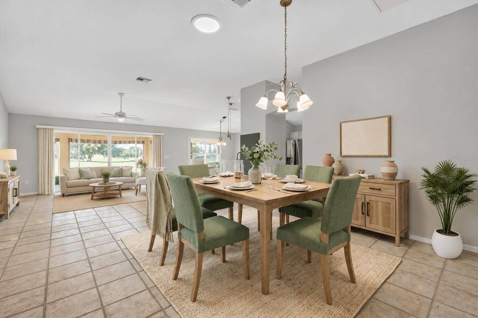 16840 SE 85TH SAPELO COURT, The Villages, FL 32162 Living and Dining Rooms-Virtually Staged
