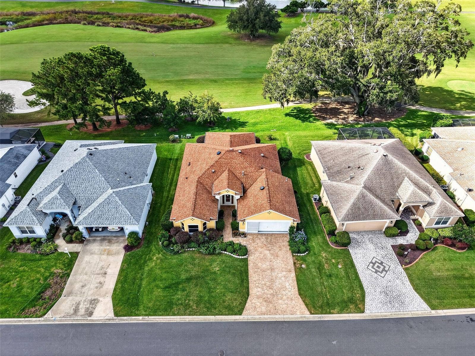 16840 SE 85TH SAPELO COURT, The Villages, FL 32162 Aerial Front Elevation with GOLF and WATER VIEWS!