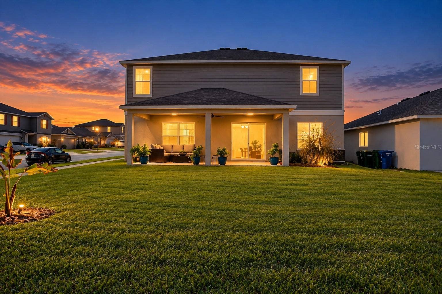 605 SARNER PASS WAY, Winter Haven, FL 33881 Backyard Twilight View