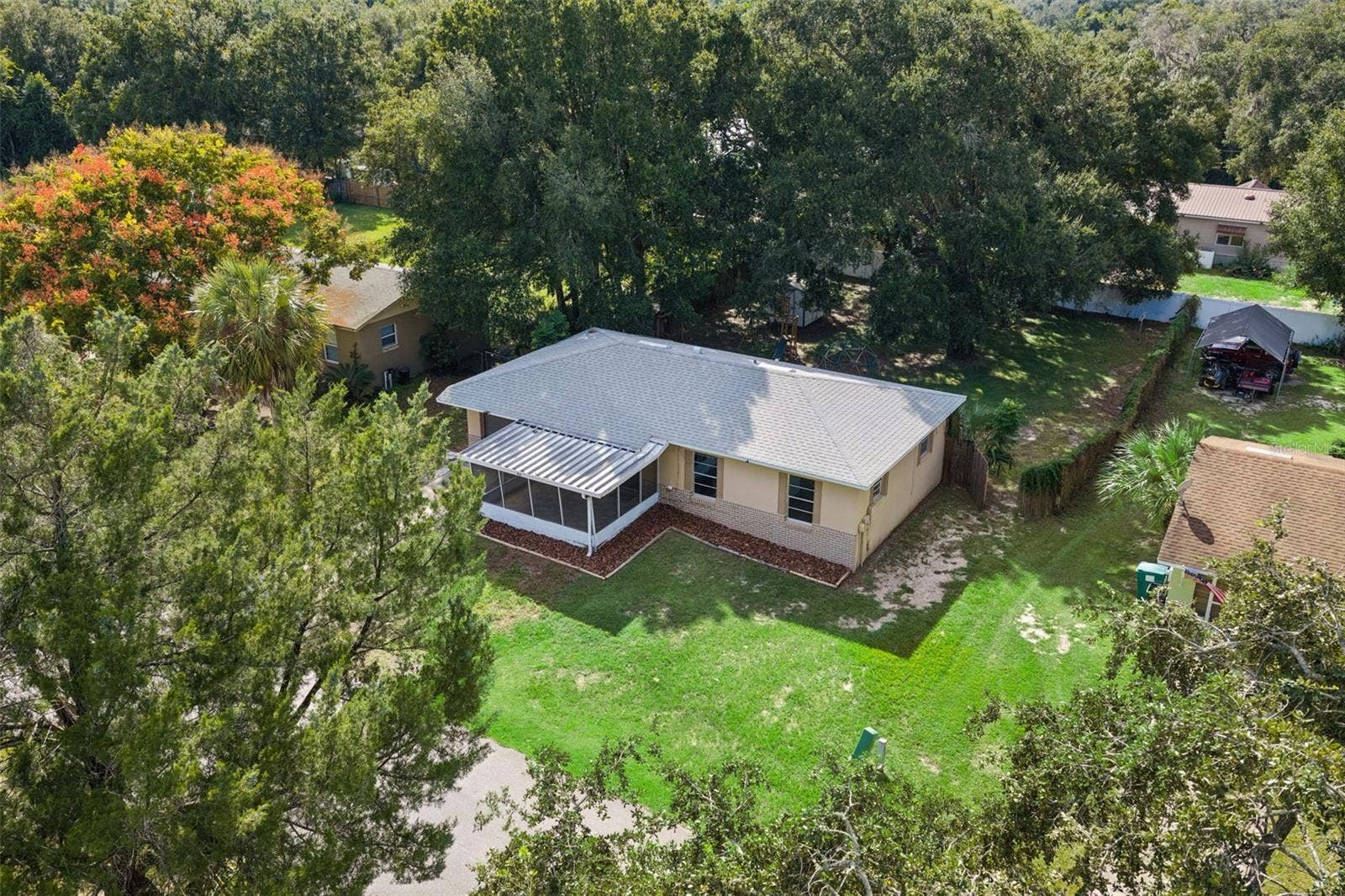 416 WINNERS CIRCLE, Lady Lake, FL 32159 Aerial over front of house.
