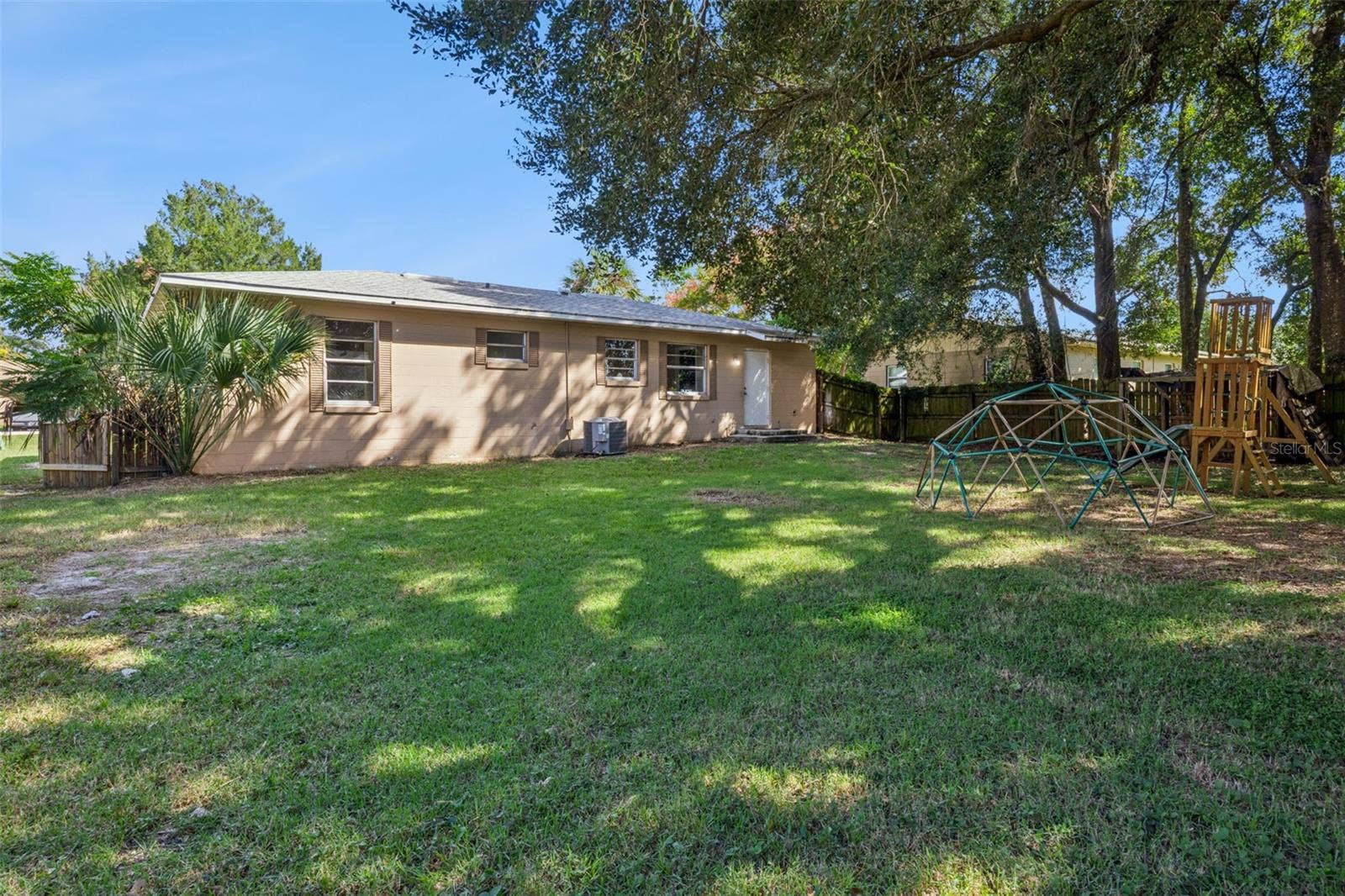 416 WINNERS CIRCLE, Lady Lake, FL 32159 Spacious backyard