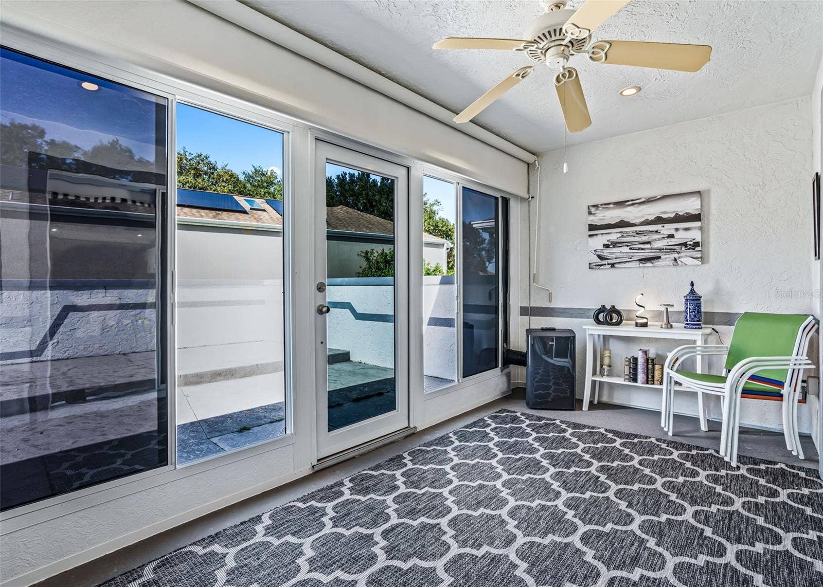 17864 SE 115TH COURT, Summerfield, FL 34491 Enclosed Fl rm. w/ portable A/C unit. new ceiling fan will be installed this week.