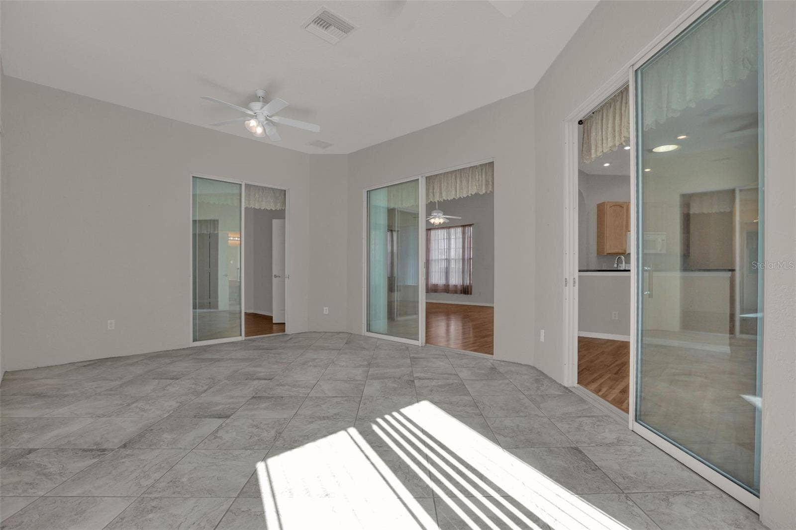 17648 SE 119TH AVENUE ROAD, Summerfield, FL 34491 enclosed lanai