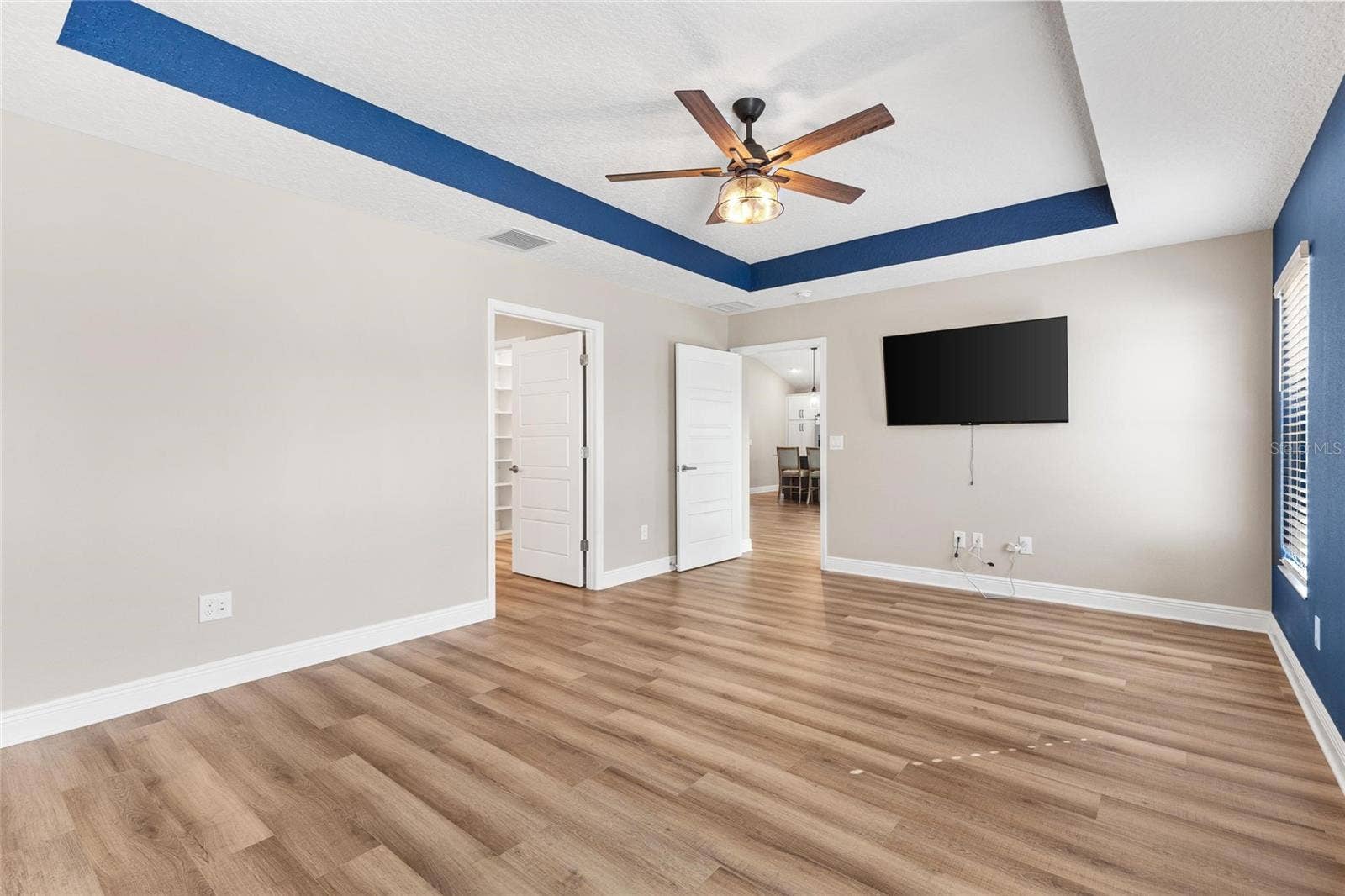 1386 KENNETH STREET, The Villages, FL 34762 Primary bedroom w/tv