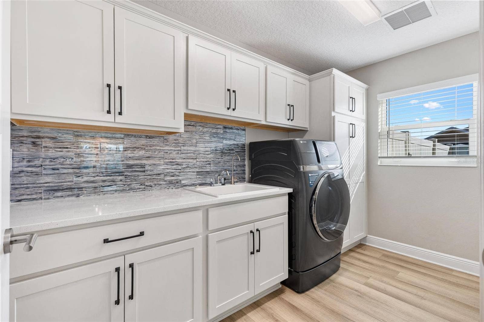 1386 KENNETH STREET, The Villages, FL 34762 Laundry Room