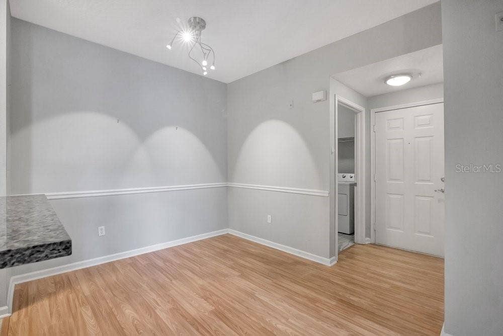 14238 FREDRICKSBURG DRIVE, #304, Orlando, FL 32837 Dining Room, Entryway, and Laundry Room