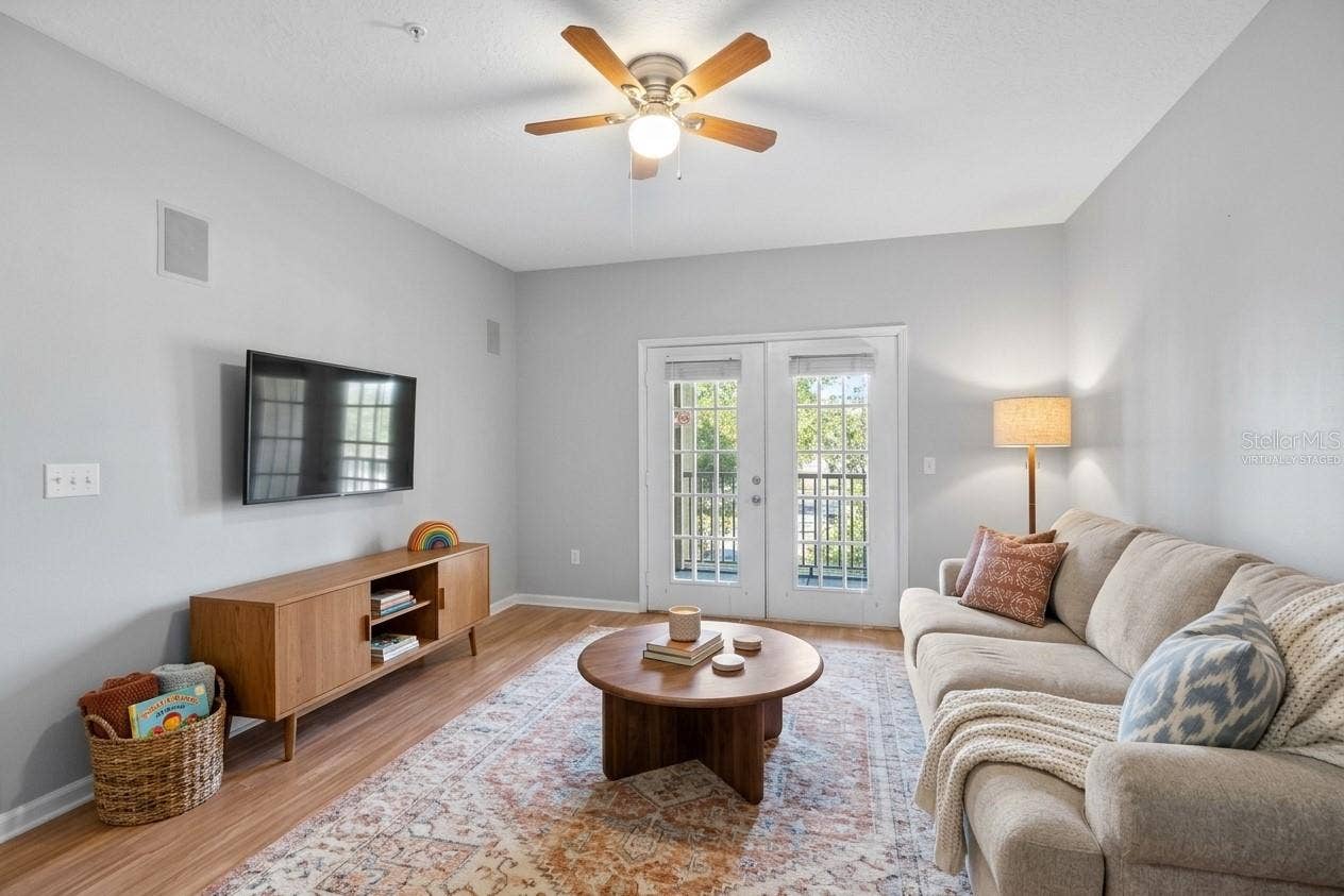 14238 FREDRICKSBURG DRIVE, #304, Orlando, FL 32837 Living room (virtually Staged)