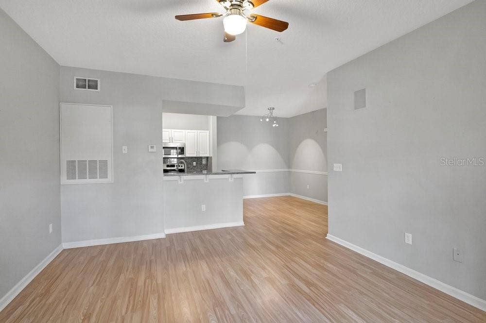 14238 FREDRICKSBURG DRIVE, #304, Orlando, FL 32837 Living to Kitchen