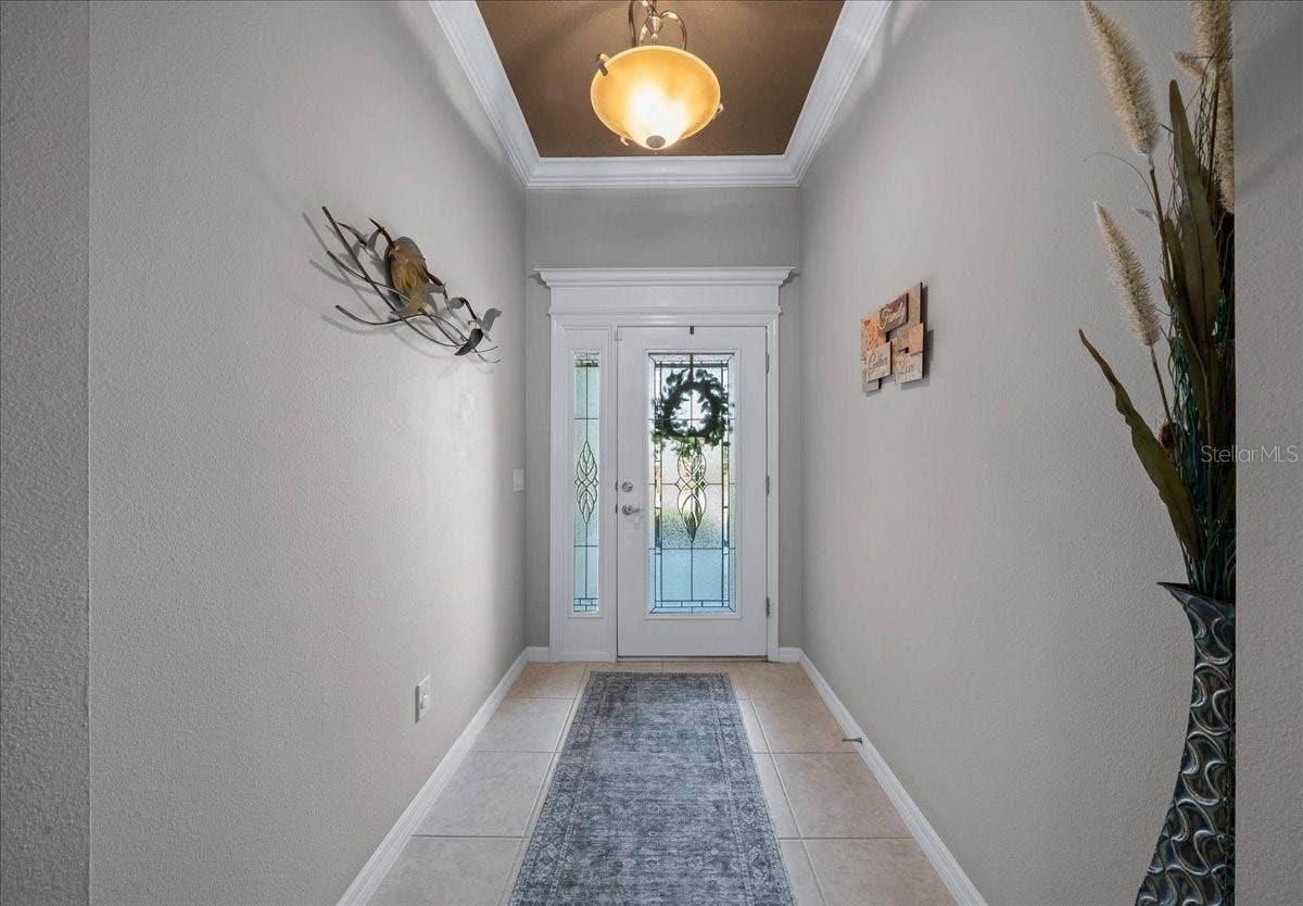 Leaded Glass Front Door and Ceramic Tile in Entrance