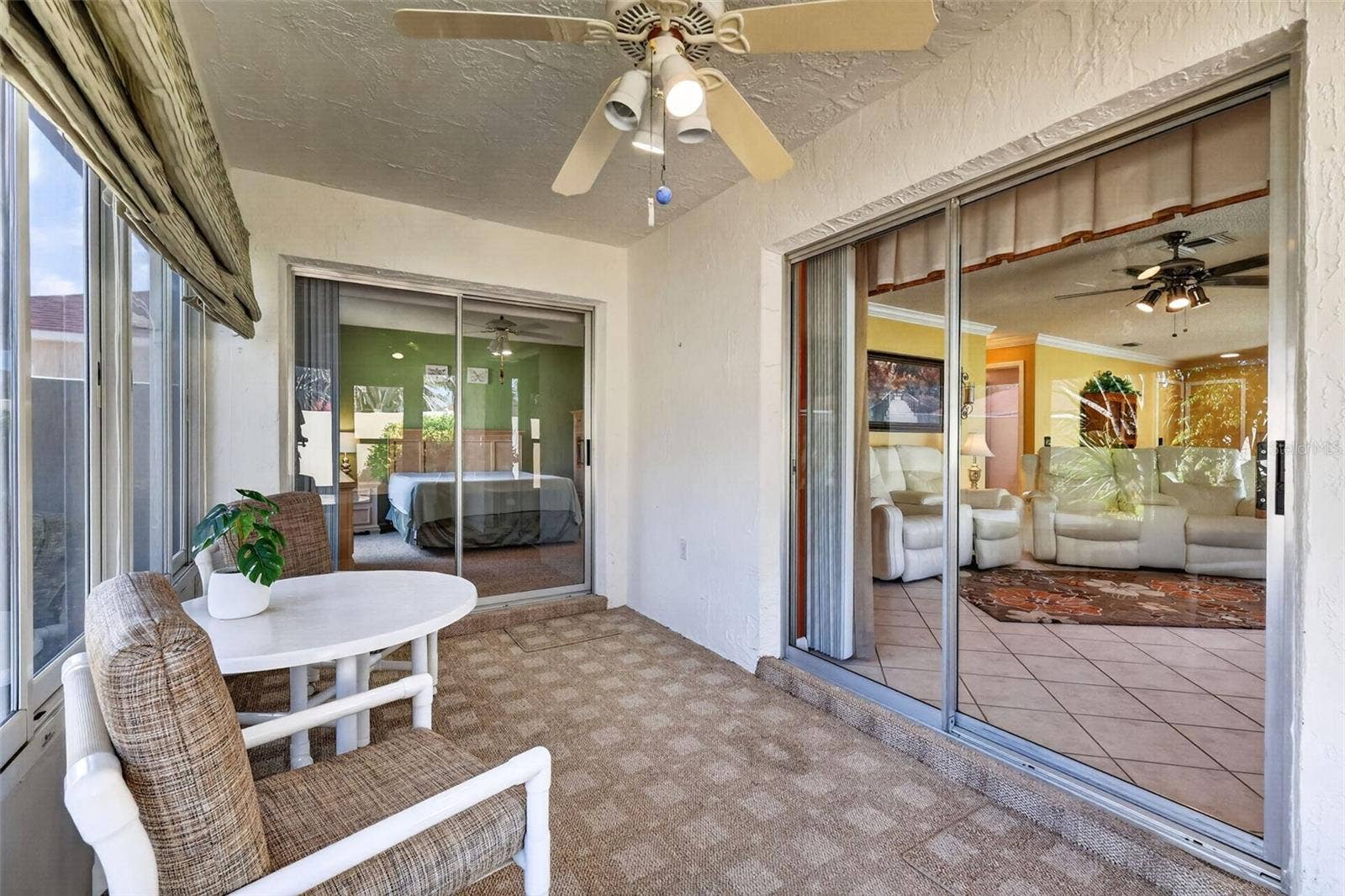 407 CARMEL AVENUE, The Villages, FL 32159 Glass-Enclosed Lanai