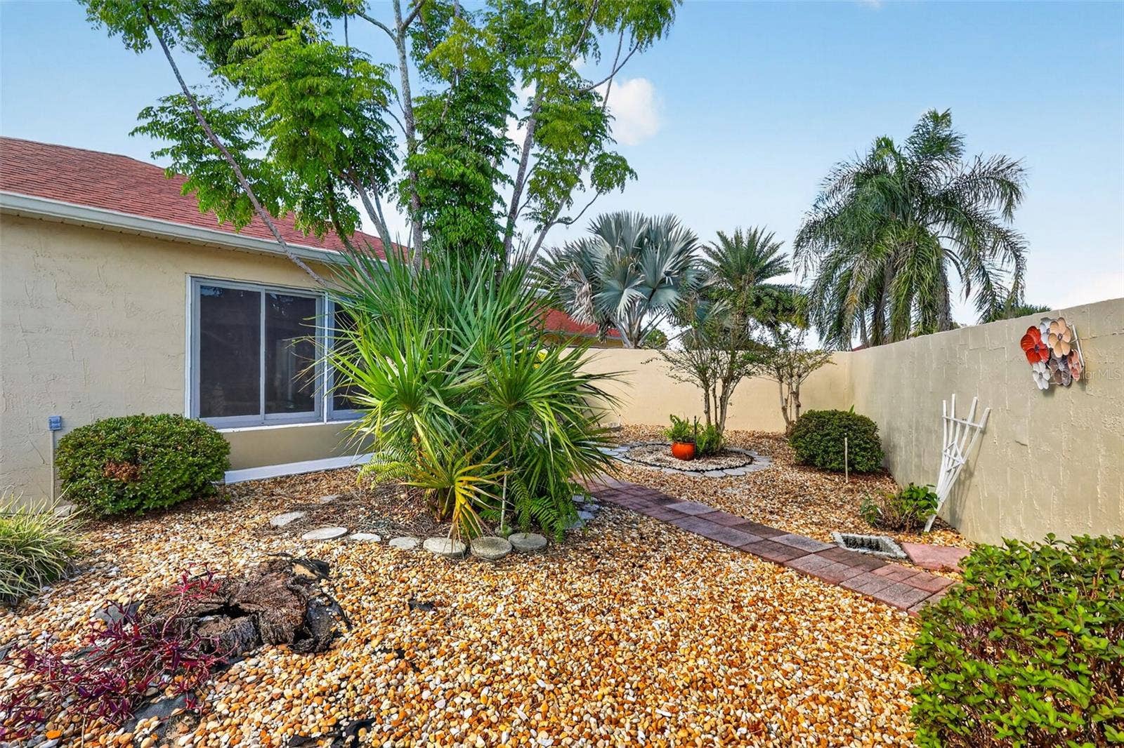 407 CARMEL AVENUE, The Villages, FL 32159 Rear Stoned Yard- NO GRASS!