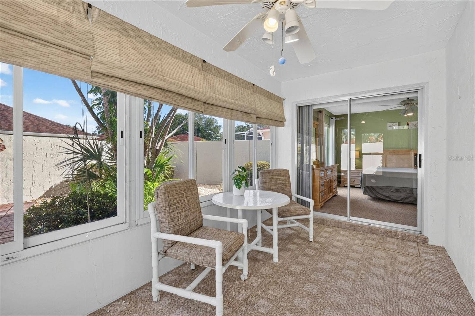 407 CARMEL AVENUE, The Villages, FL 32159 Glass-Enclosed Lanai