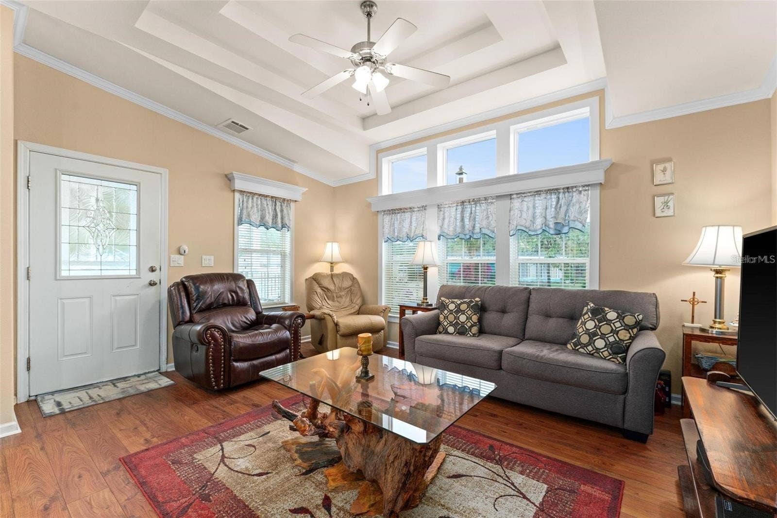 2417 VINDALE ROAD, Tavares, FL 32778 Living room with tray ceilings